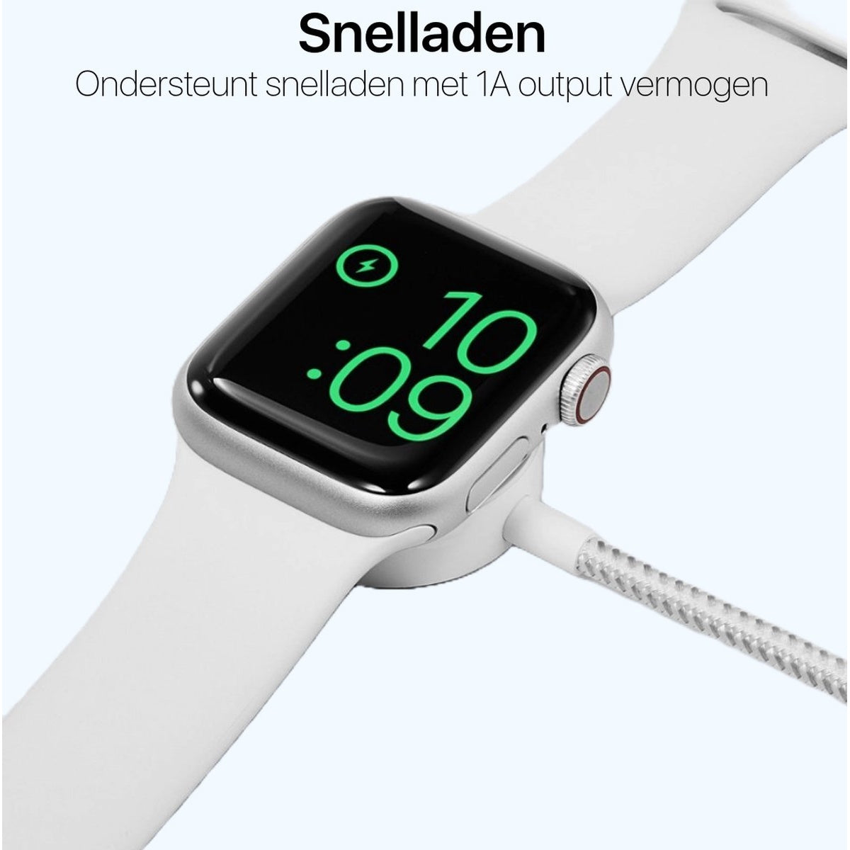 An Apple Watch with white band is charging. The screen displays 10:09. A lightning bolt icon is visible. A charging cable is plugged in.