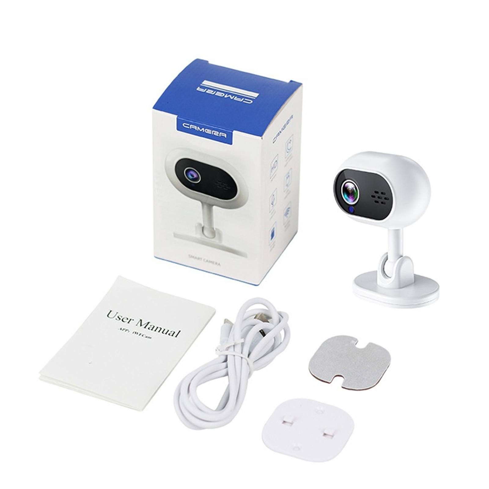 Eine weiße Smart-Kamera mit Box, Handbuch, Kabel, Pad und Stecker liegen auf einer weißen Oberfläche. Die Kamera ist rund.