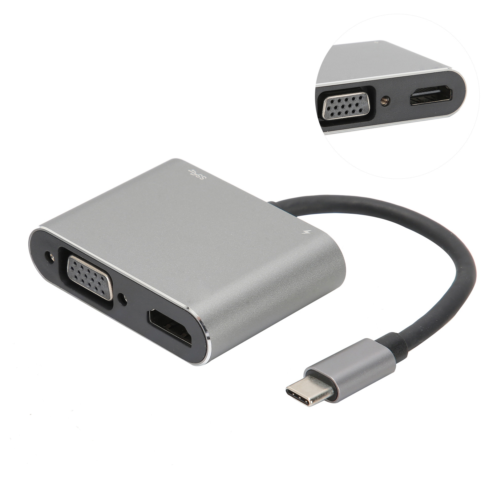 Ein silberner USB-C-Adapter mit mehreren Anschlüssen, darunter HDMI, VGA und USB-C. Eine Nahaufnahme zeigt die Anschlüsse.