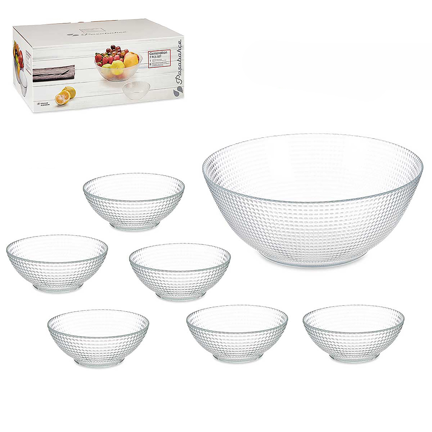 Un juego de cuencos de vidrio transparente. Un cuenco grande está rodeado de seis cuencos más pequeños. Una caja con cuencos de fruta está en el fondo.