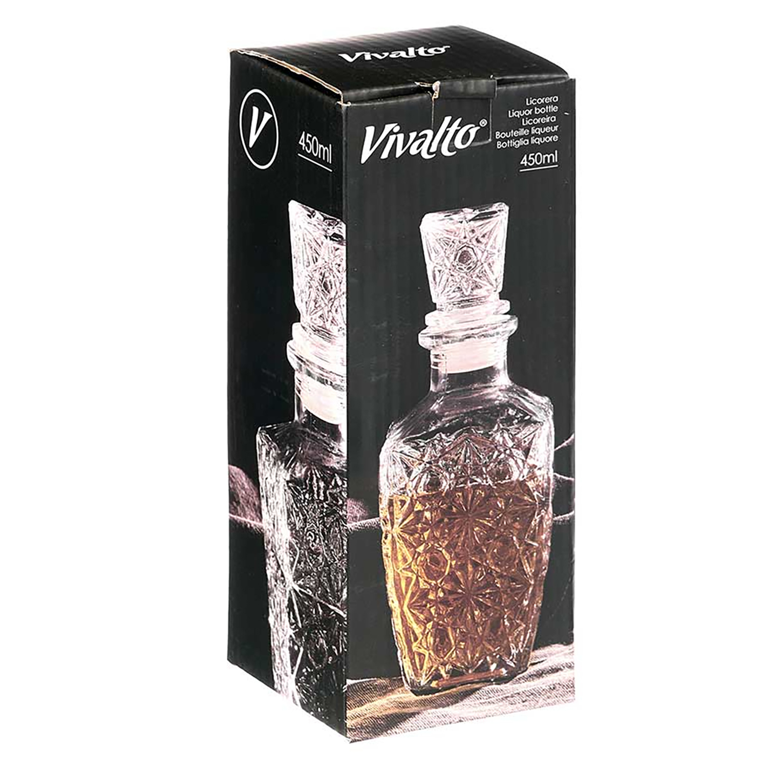 Una botella de licor en una caja. La botella es transparente con un diseño decorativo. La caja es negra con la marca y los detalles de la botella.