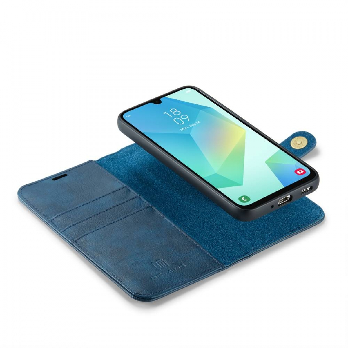 Ein Smartphone in einer blauen Hülle ist geöffnet. Das Telefon zeigt Uhrzeit und Datum an. Die Hülle ist lederartig mit einem Druckverschluss.