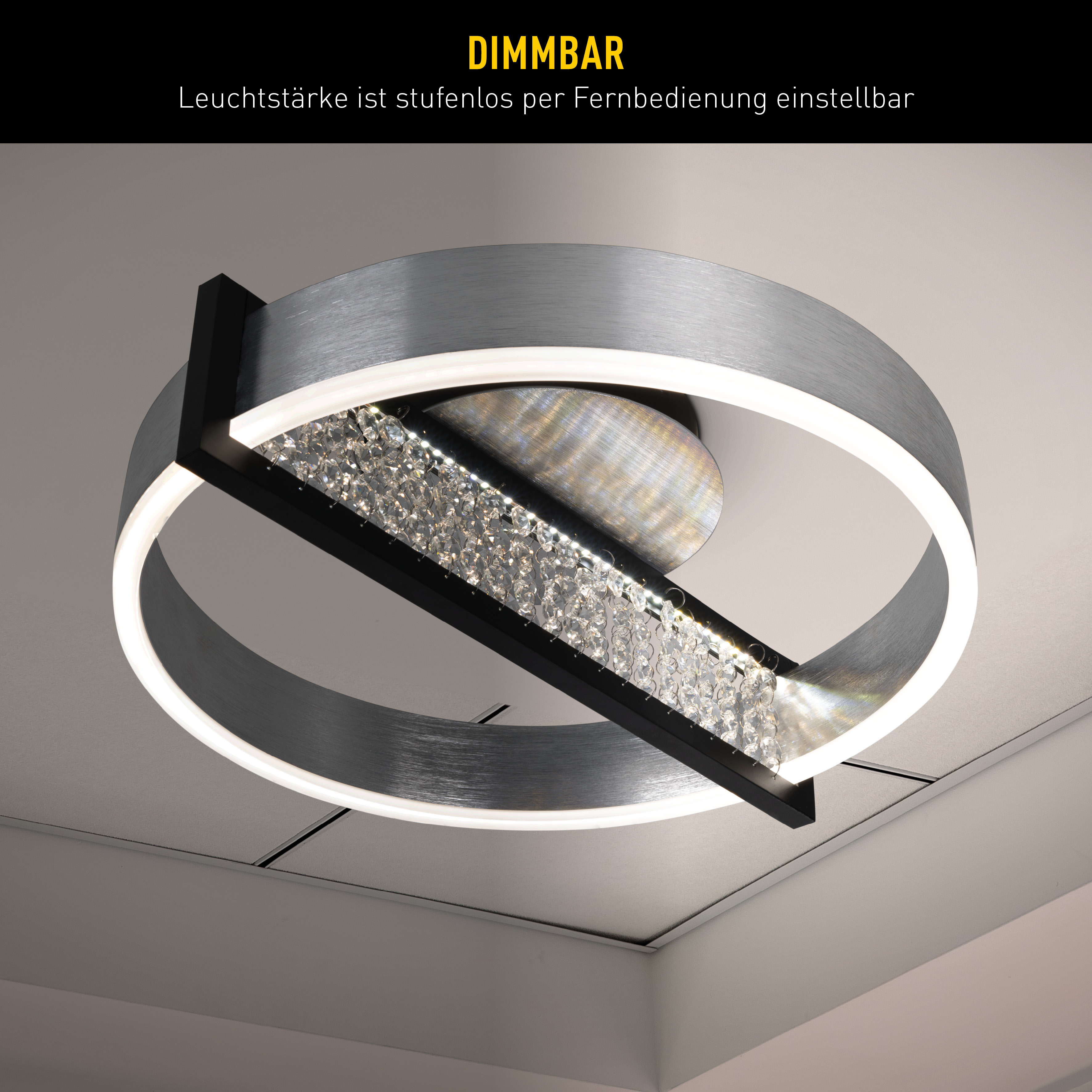 Moderne Deckenlampe mit kreisförmigem Design. Sie hat einen schwarzen Rahmen, Kristallakzente und weiße LED-Leuchten.