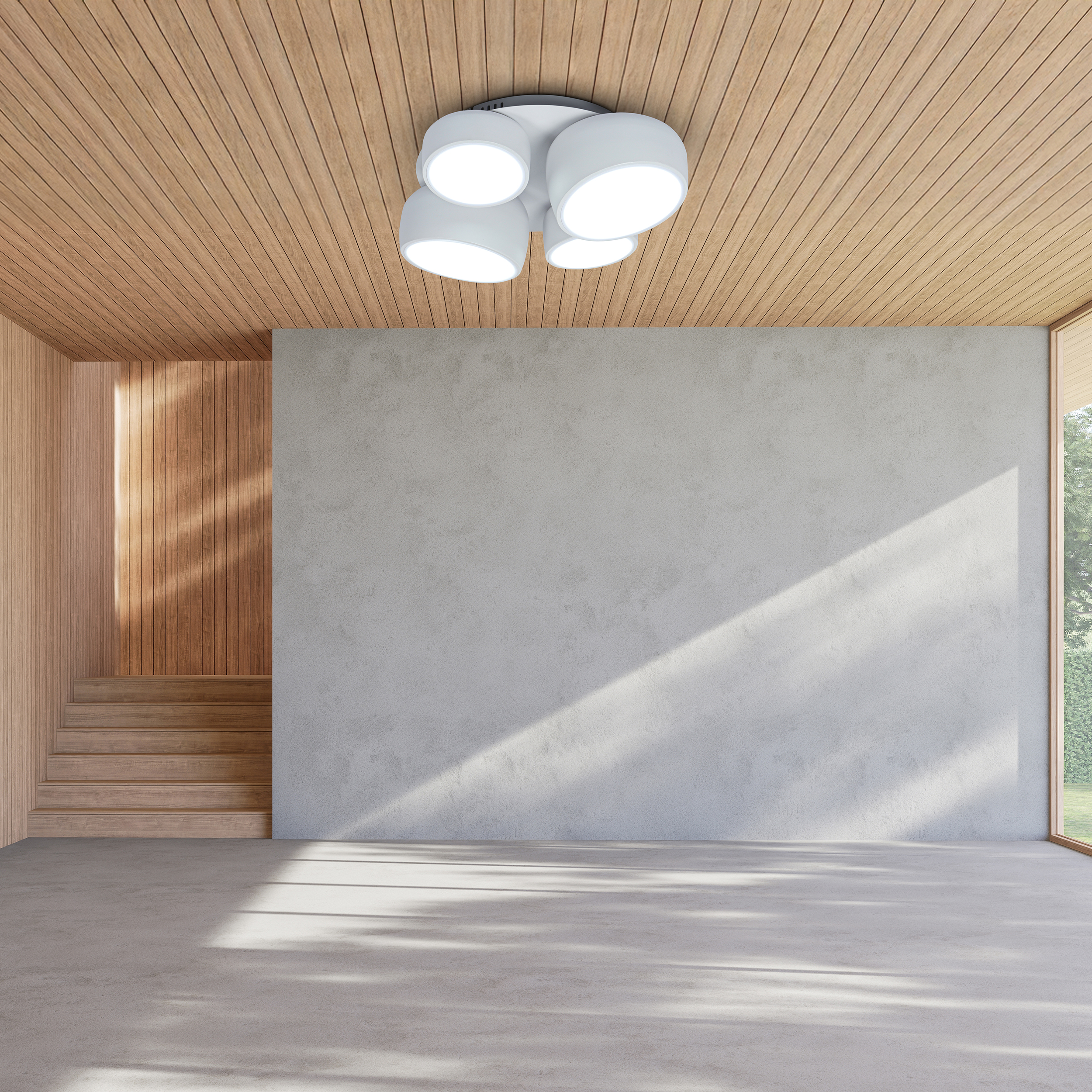 Innenaufnahme eines Raumes mit Holzdecke, Betonwand und -boden sowie einer Treppe. Eine moderne Leuchte befindet sich an der Decke.