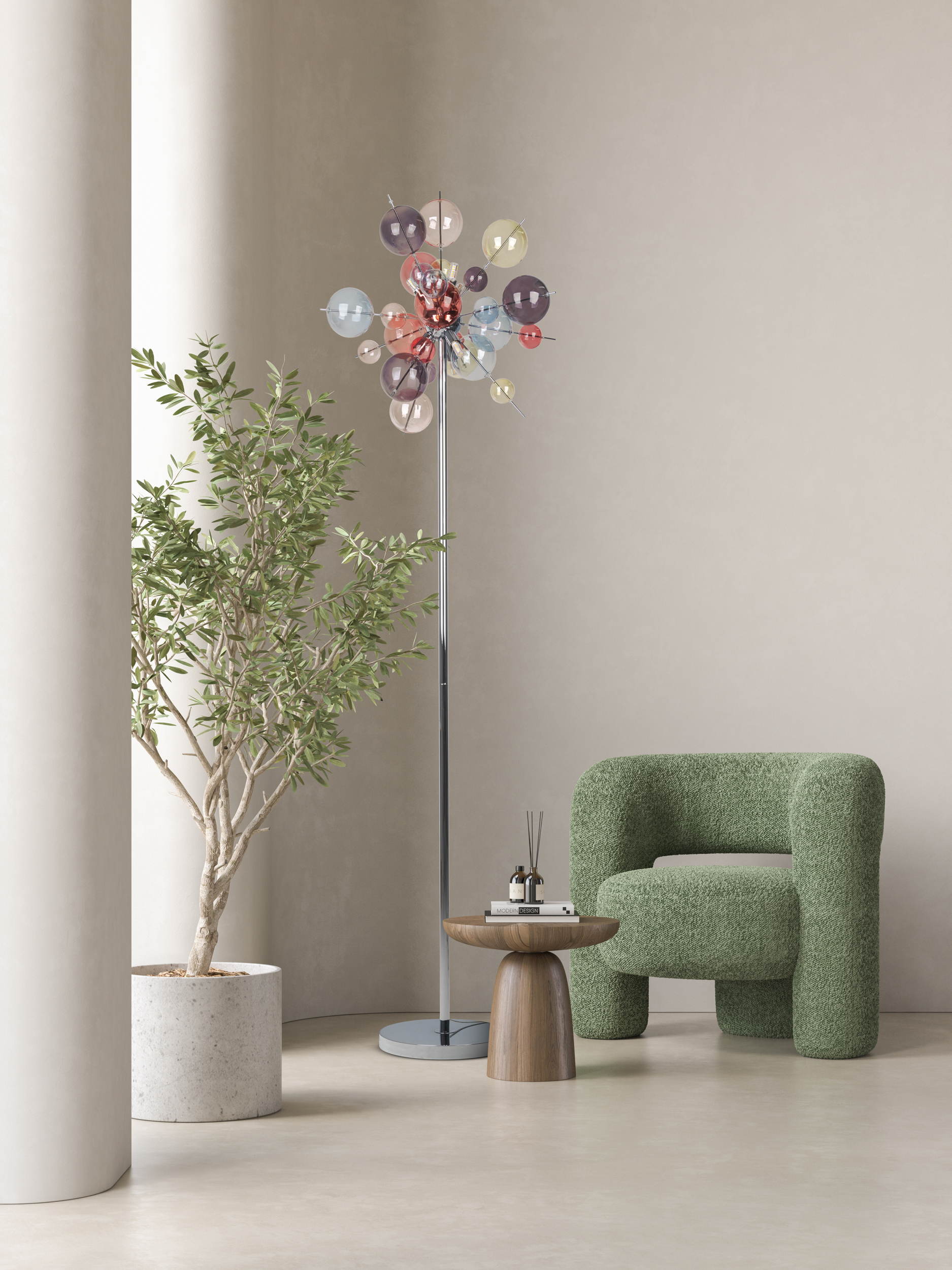 Raum mit grünem Stuhl, Baum, Lampe mit bunten Kugeln und kleinem Tisch.