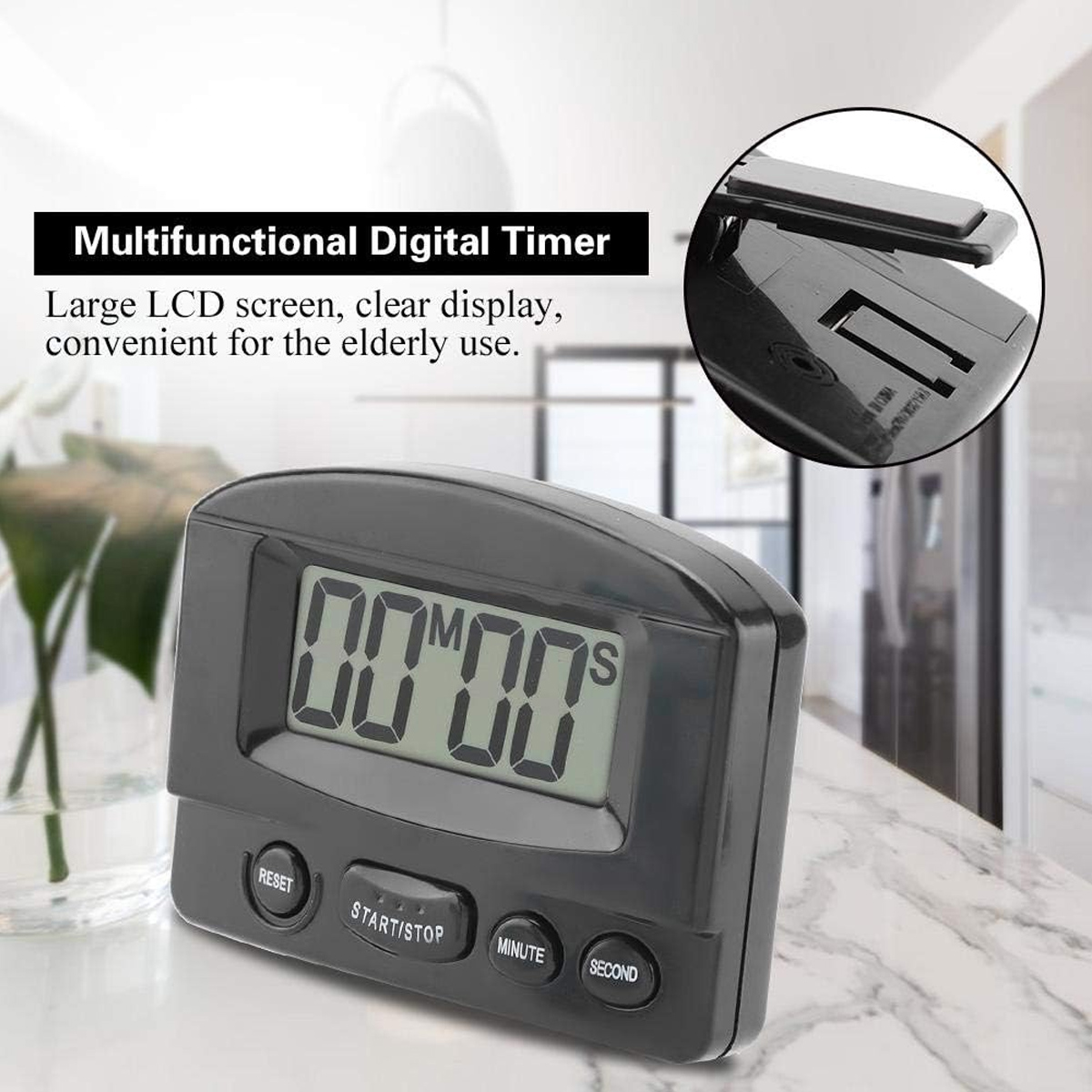 Ein schwarzer digitaler Timer zeigt 00:00 an. Tasten sind Zurücksetzen, Start/Stopp, Minute und Sekunde. Er steht auf einer weißen Arbeitsplatte.