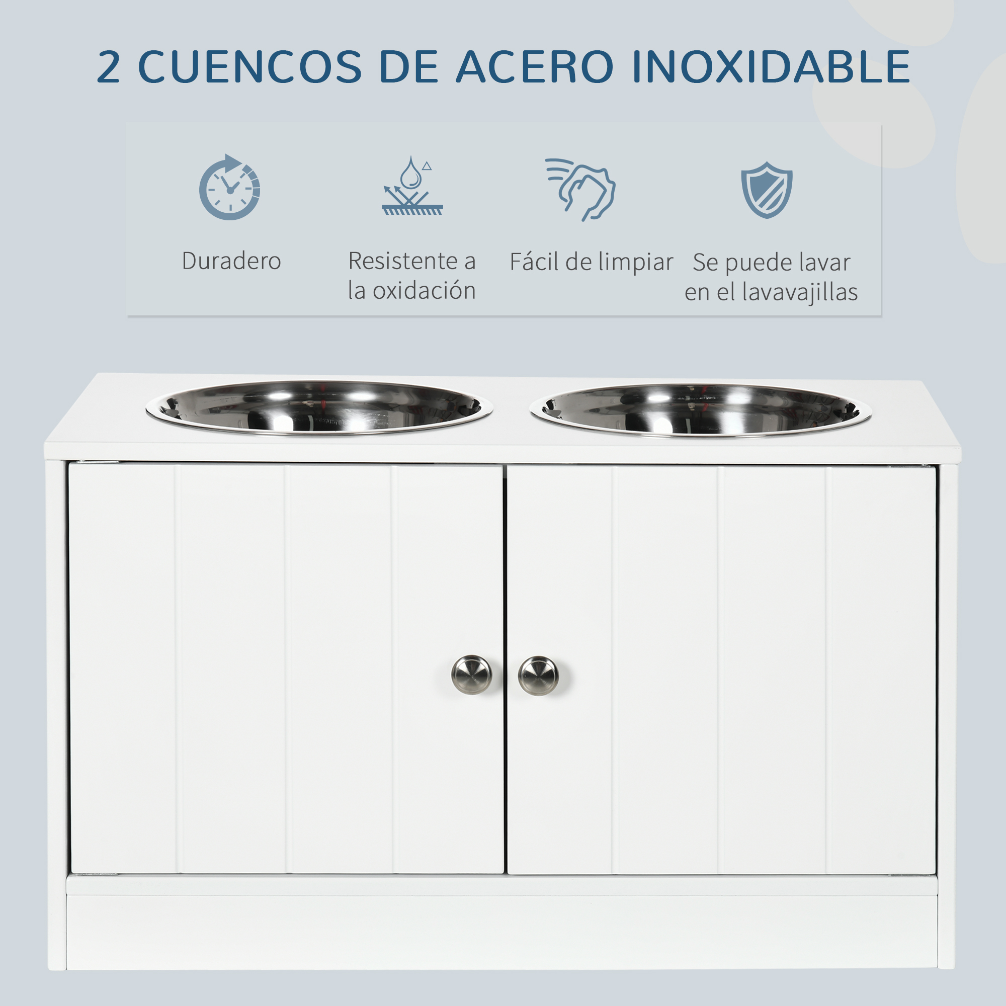 Soporte blanco para comida de mascotas con dos cuencos de acero inoxidable. El soporte tiene dos puertas con pomos plateados.