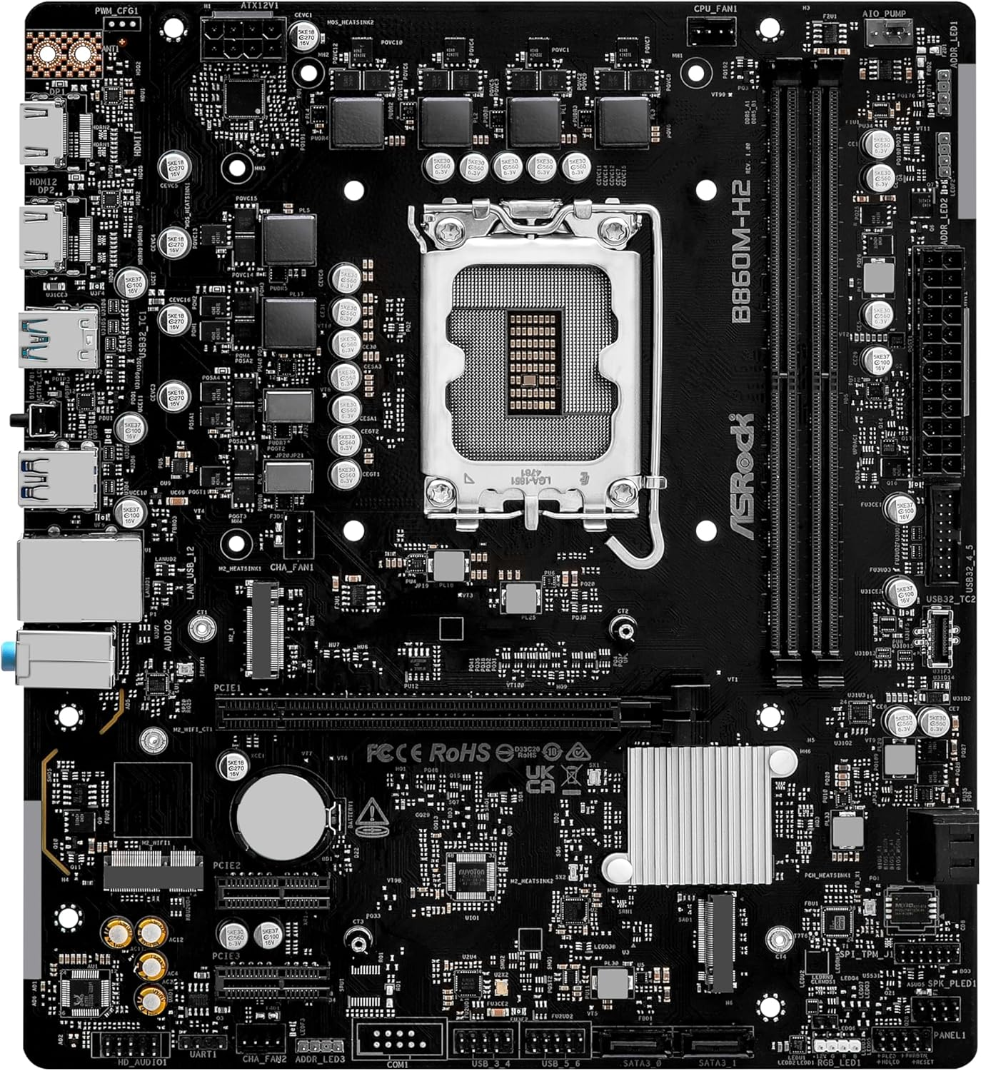 Czarna płyta główna komputera z widocznymi elementami elektronicznymi i złączami.
