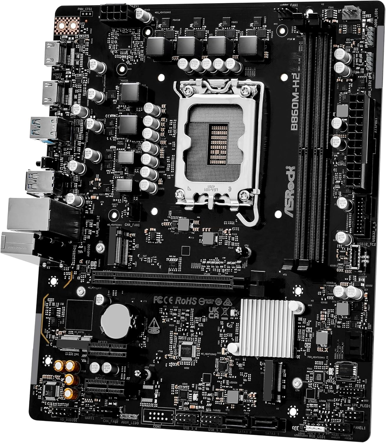 Czarna płyta główna ASRock ze srebrnymi komponentami. Gniazdo CPU pośrodku, różne porty i gniazda.