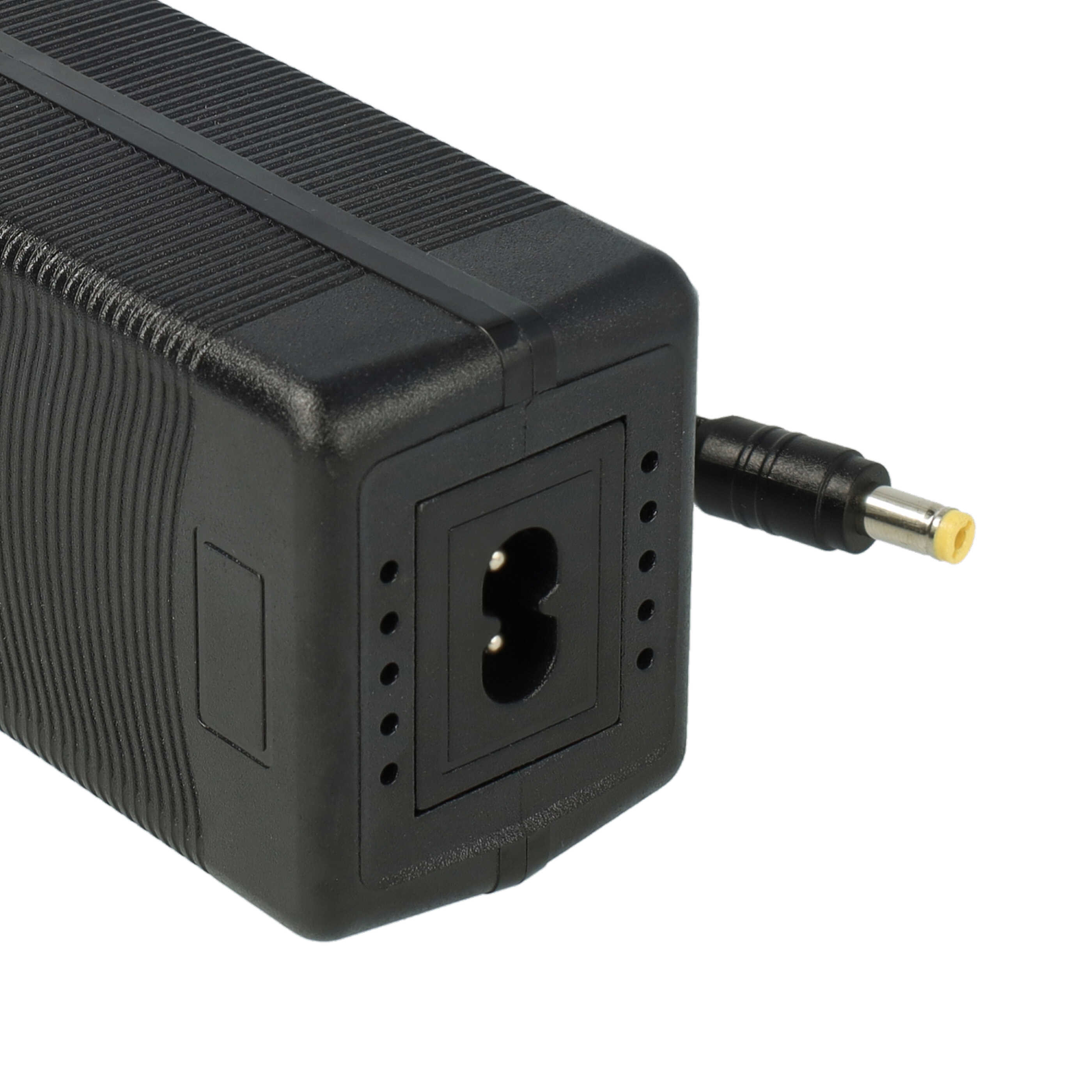 Schwarzes Netzteil mit Stecker und DC-Anschluss. Der Stecker ist schwarz mit gelber Spitze.
