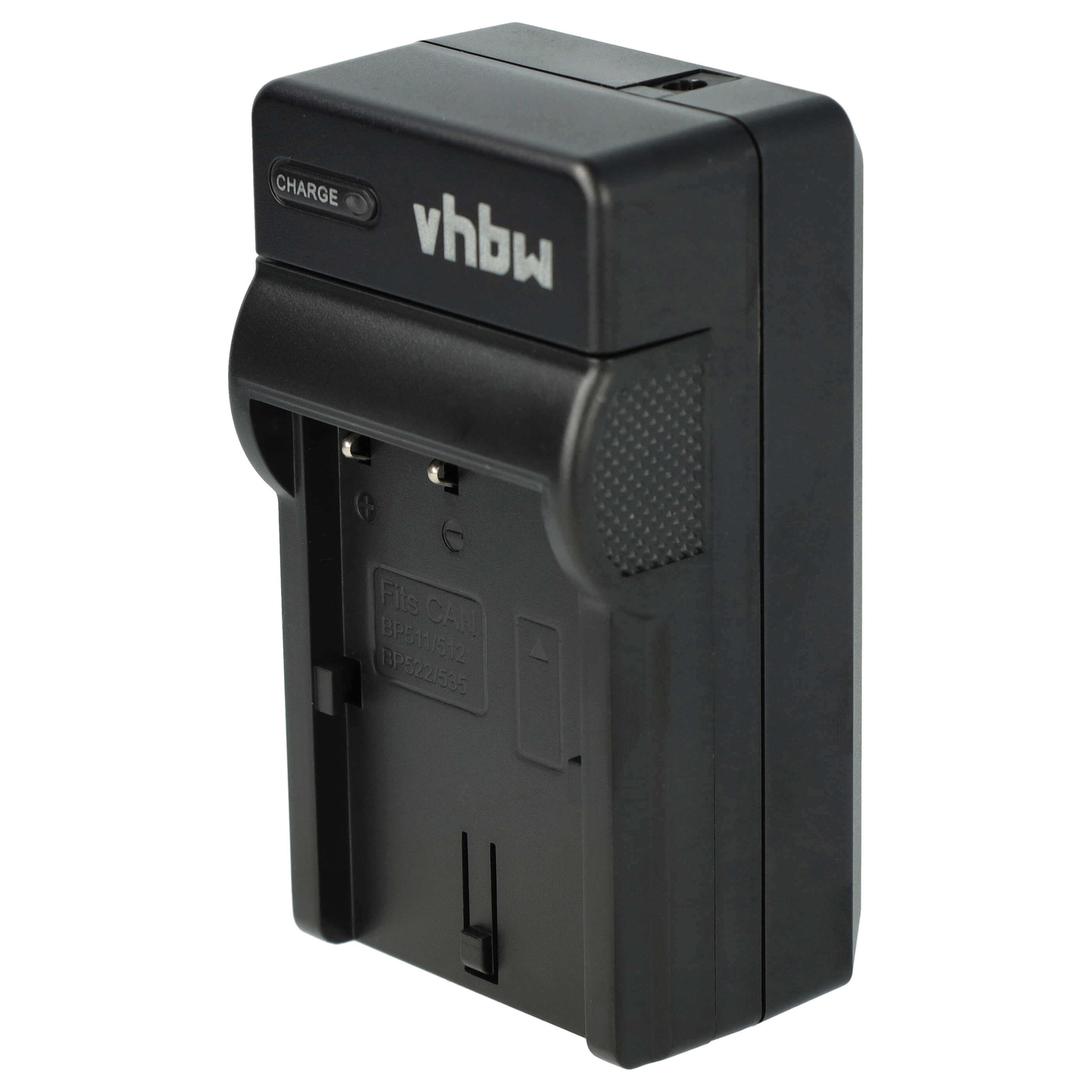 Schwarzes Batterieladegerät, Marke 'vhbw', mit 'CHARGE'-Anzeige. Es ist für Canon-Akkus konzipiert, isoliert auf weißem Hintergrund.