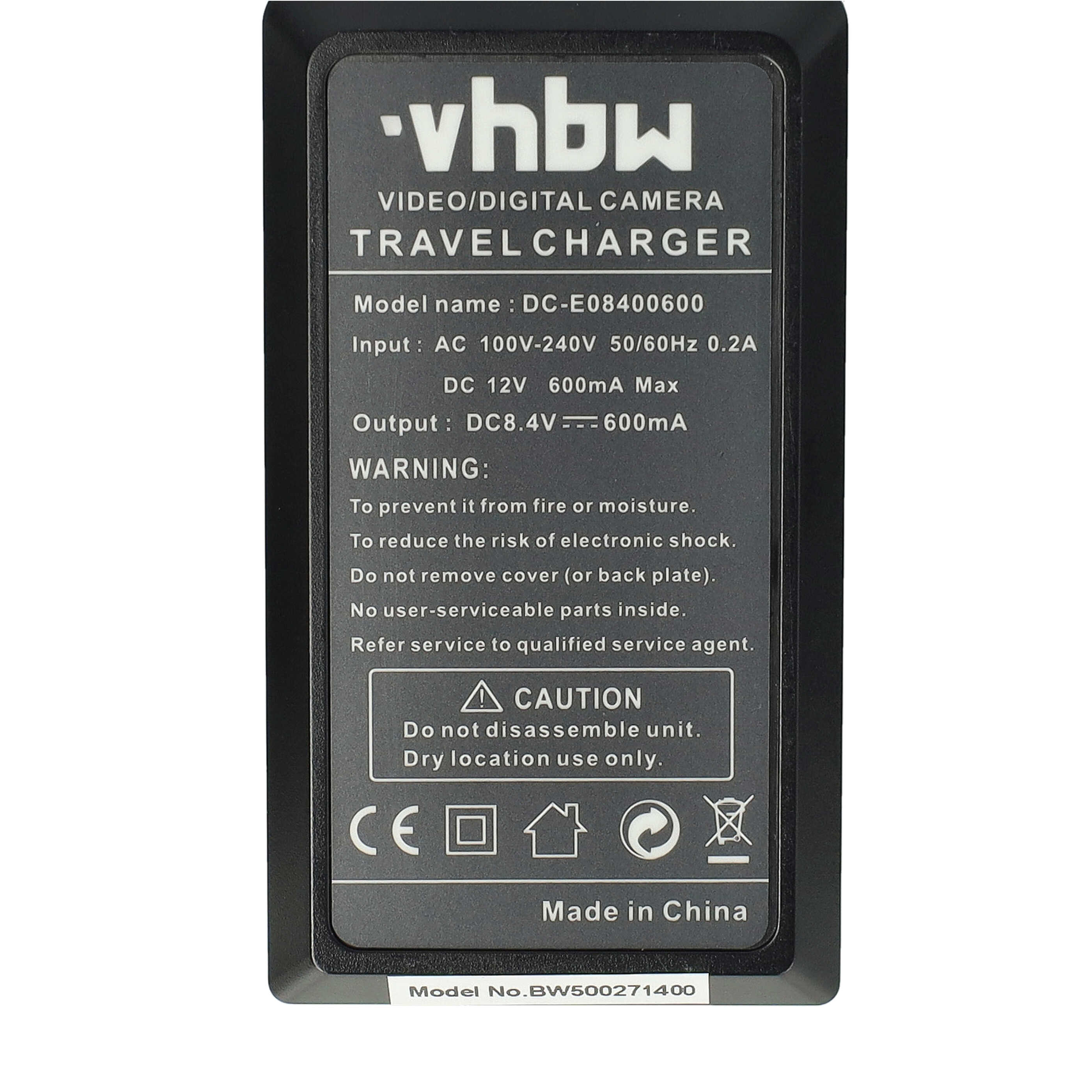 Schwarzes Reisegerät mit weißem Text: vhbw, Video/Digitalkamera-Reiseladegerät. Es hat Warnungen und sagt Made in China.