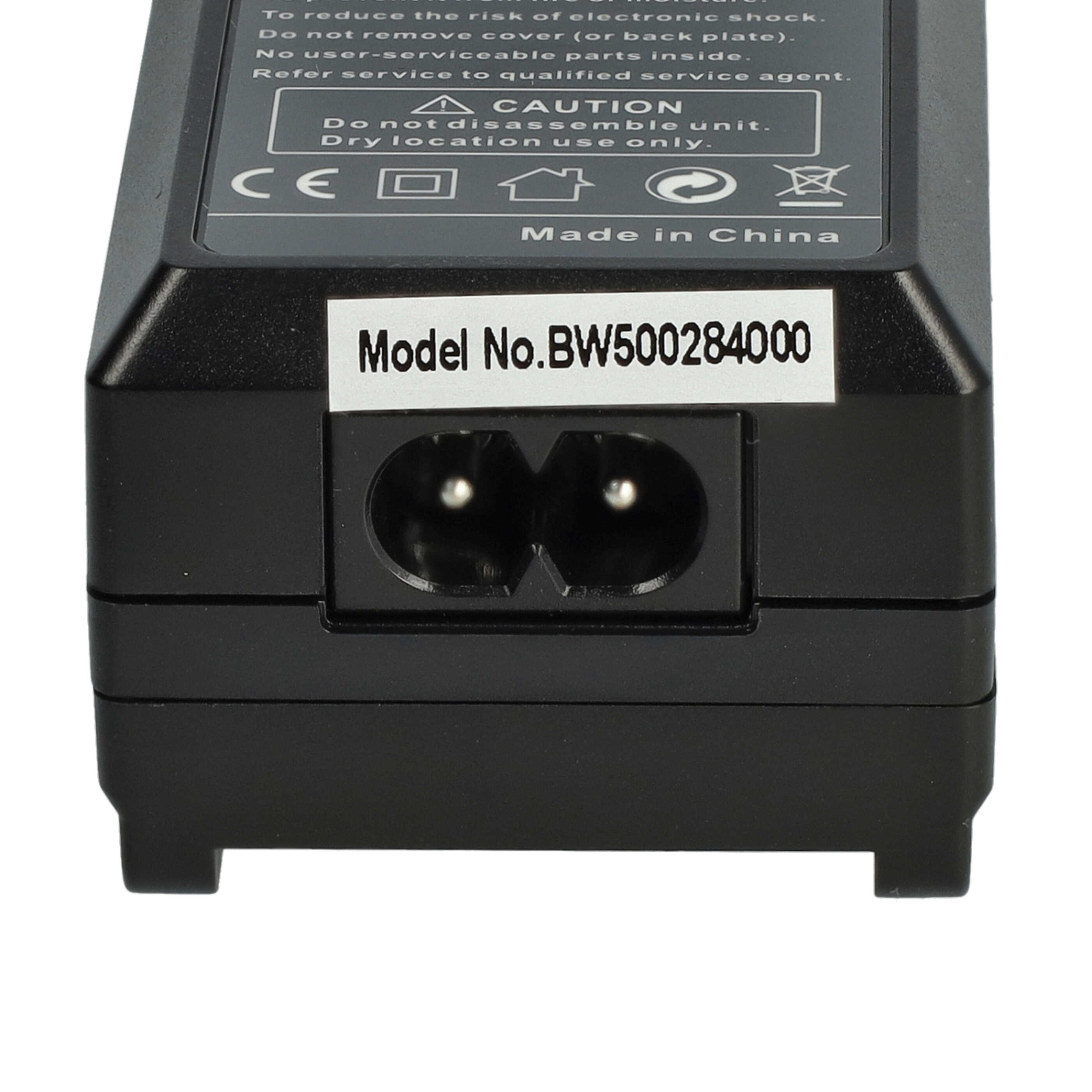 Schwarzes Netzteil mit Stecker. Es hat ein Etikett mit Modellinformationen.