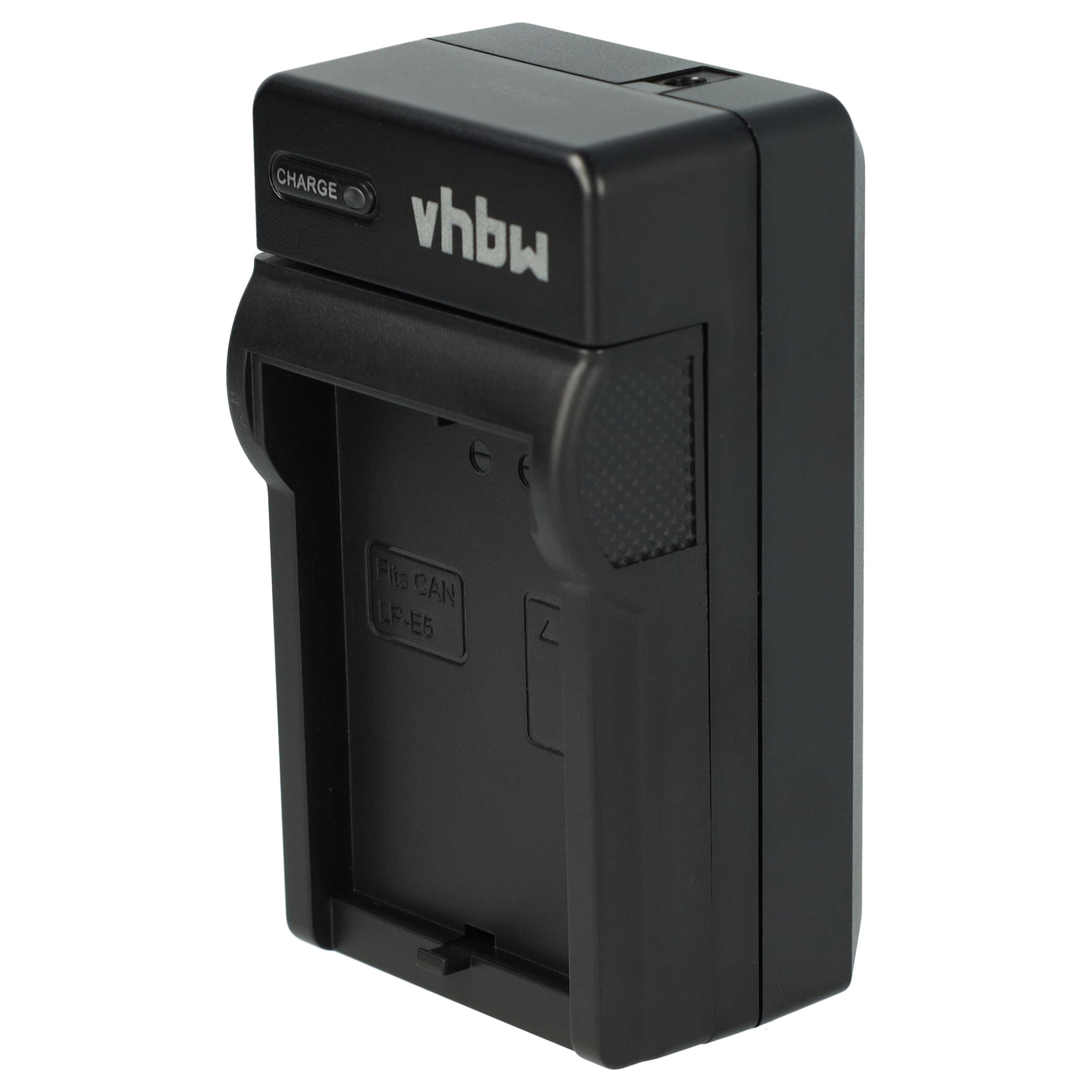 Schwarzes Kamera-Akkuladegerät mit Aufdruck 'vhbw' und 'Fits CAN LP-E5'. Eine 'Charge'-Anzeige ist sichtbar.