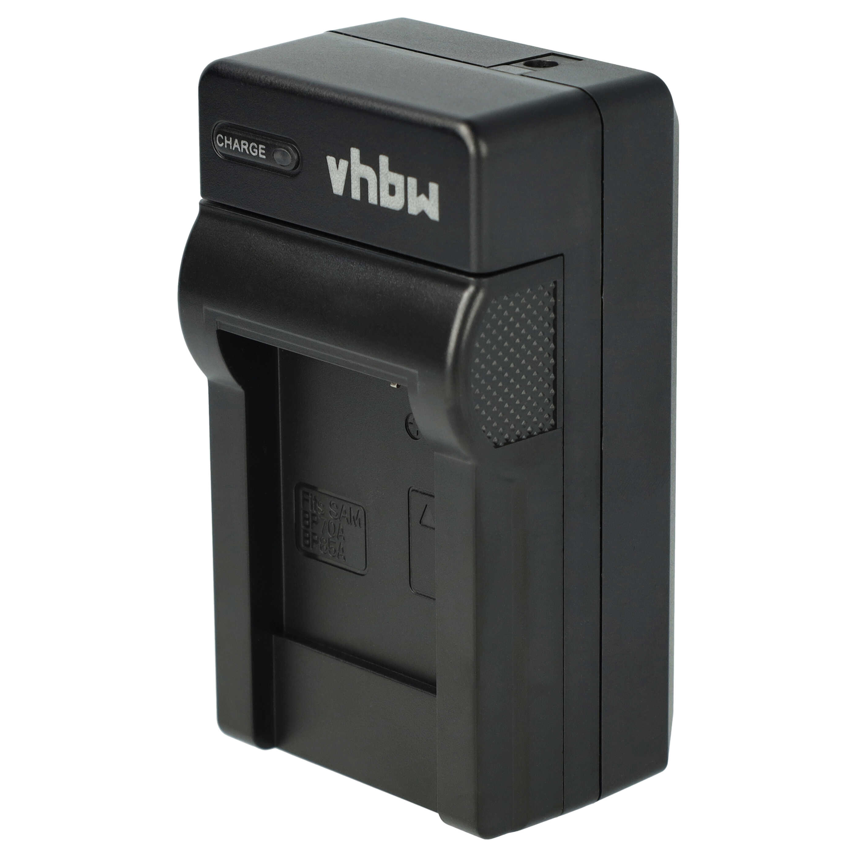 Ein schwarzes Batterieladegerät mit dem Text 'vhbw' und einer 'Charge'-Anzeige. Das Ladegerät hat einen Steckplatz für Batterien.