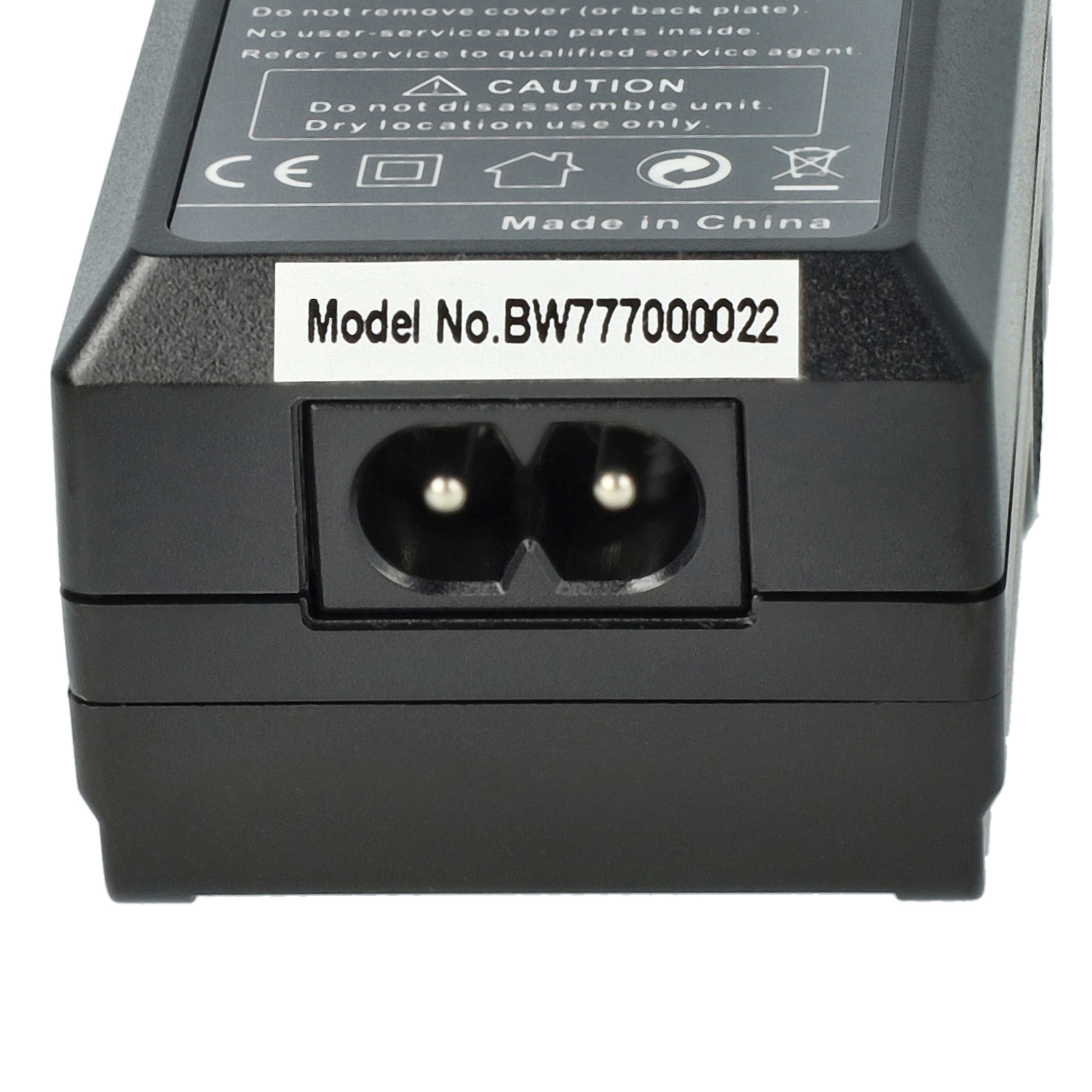 Schwarzer Adapter mit Stromeingang, weißem Etikett mit Modellnummer und Regulierungszeichen. Hergestellt in China ist gedruckt.