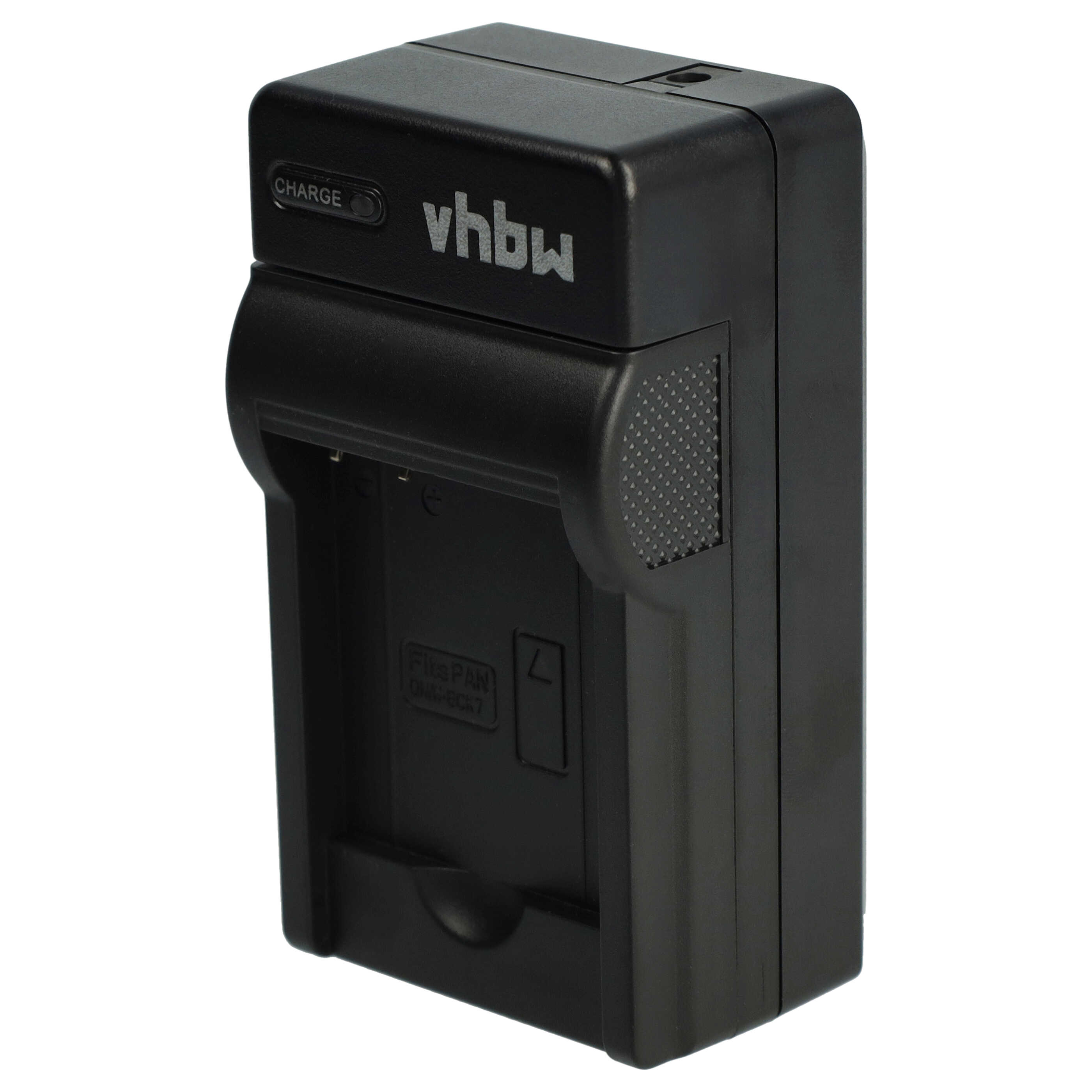 Ein schwarzes vhbw-Batterieladegerät. Es hat eine Ladeanzeige und einen Steckplatz für eine Batterie.