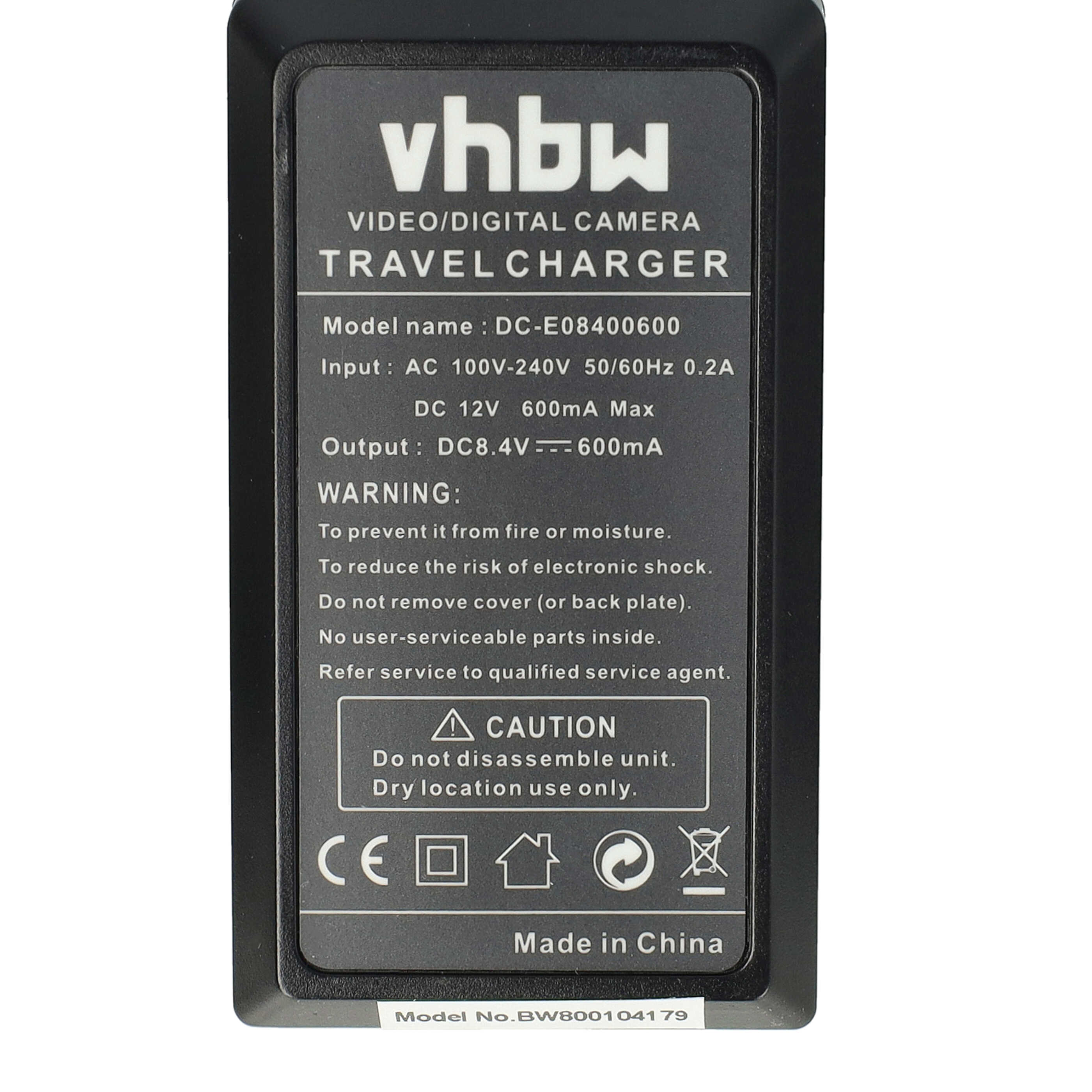 Schwarzes Ladegerät mit weißem Text. Es steht "vhbw" und "Travel Charger" drauf. Hat Warnungen, Vorsicht und Modellnummer.