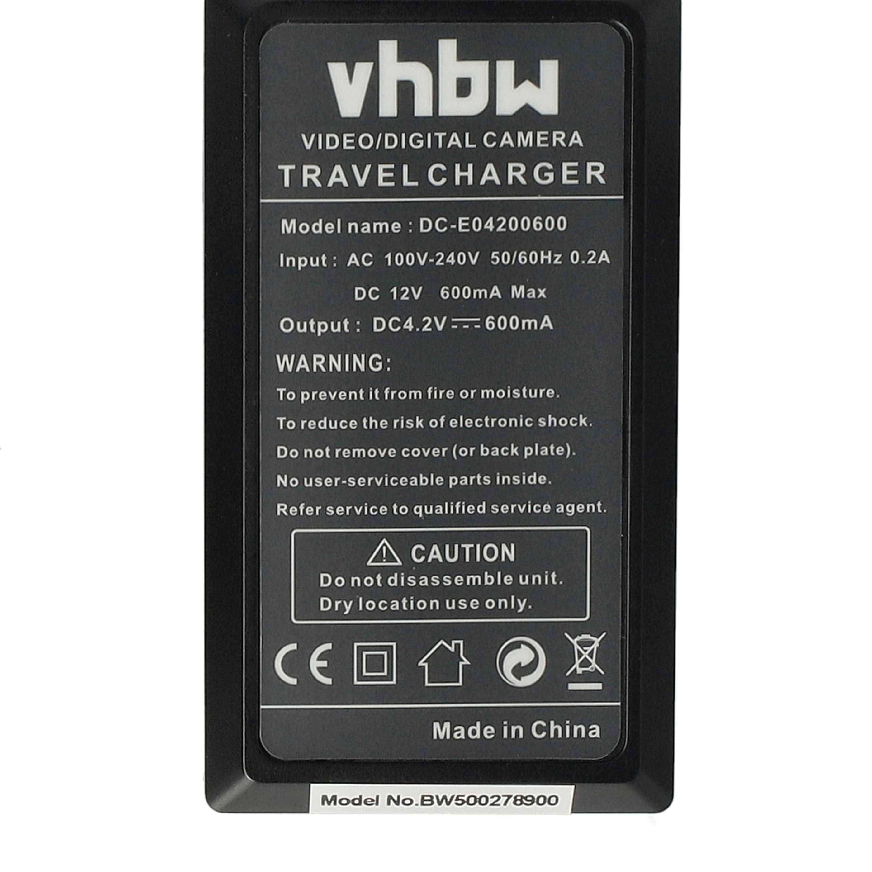 Schwarzes Ladegerät mit weißem Text. Es steht 'vhbw VIDEO/DIGITAL CAMERA TRAVEL CHARGER'. Hat Warnungen und Modellinformationen.