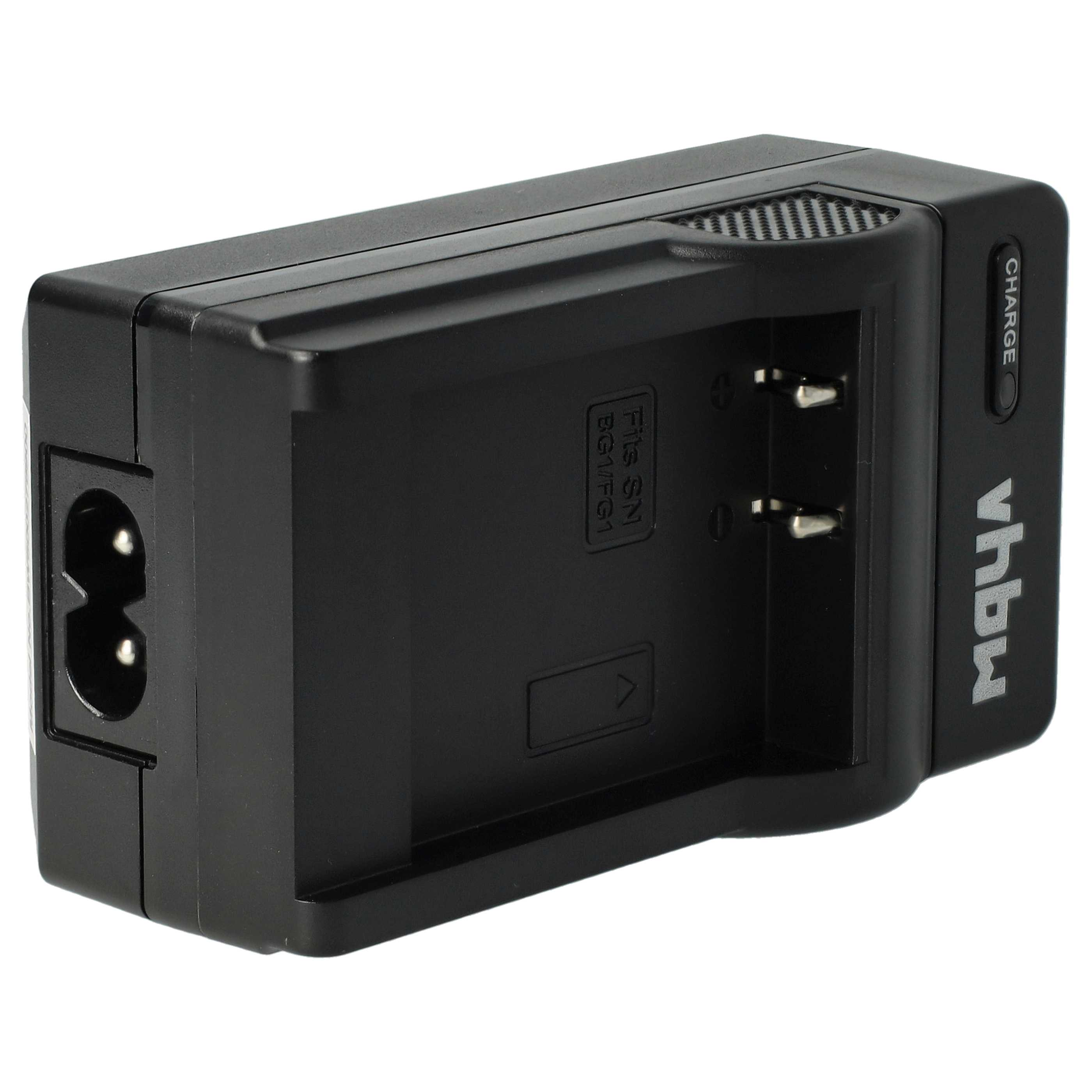 Ein schwarzes Vhbw-Kamera-Akkuladegerät. Es hat einen Stecker an der Seite und eine Ladeanzeige.