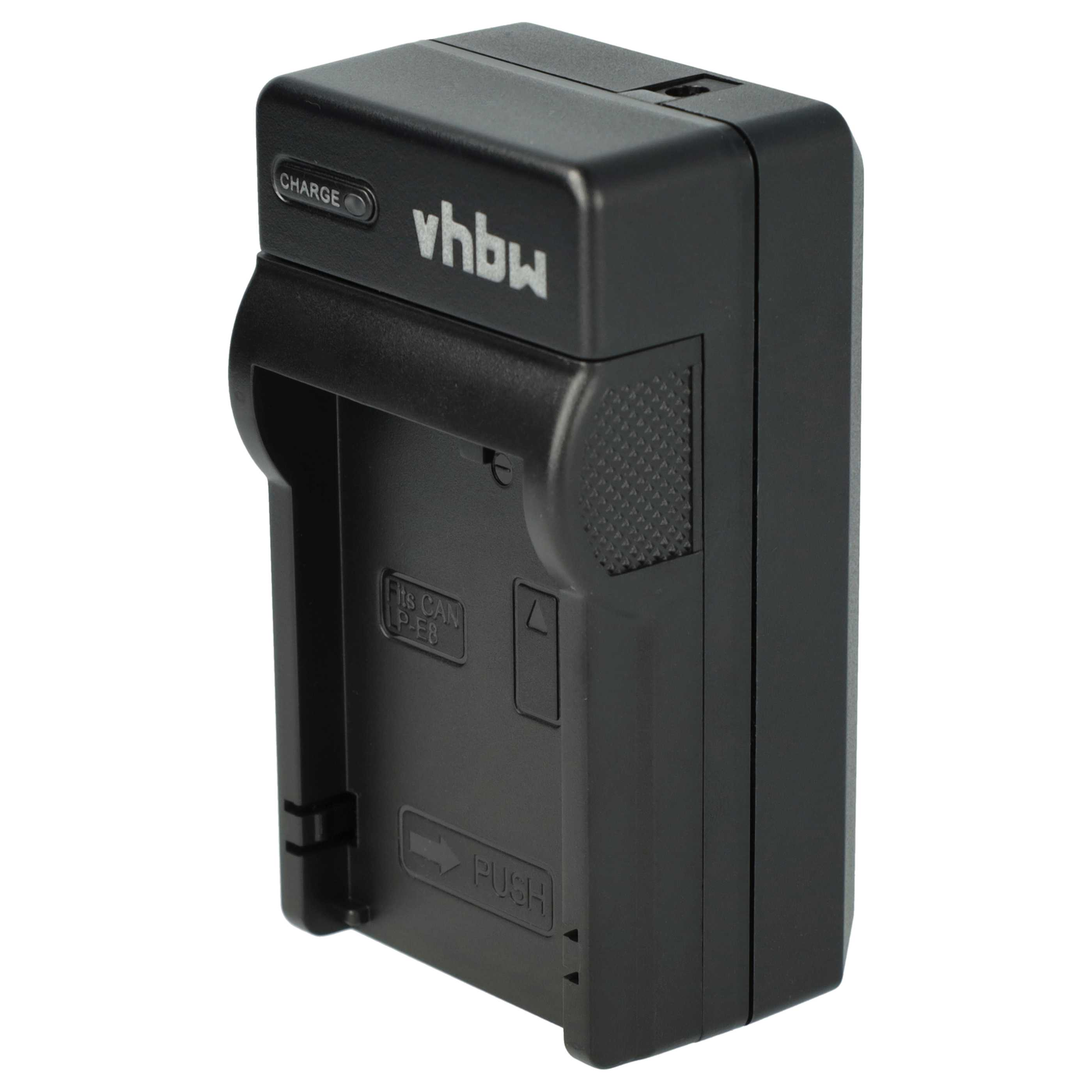 Schwarzes Batterieladegerät mit der Aufschrift 'CHARGE' und dem Logo 'vhbw'. Mit 'PUSH'-Taste und Text 'Fits CAN LP-E8'.