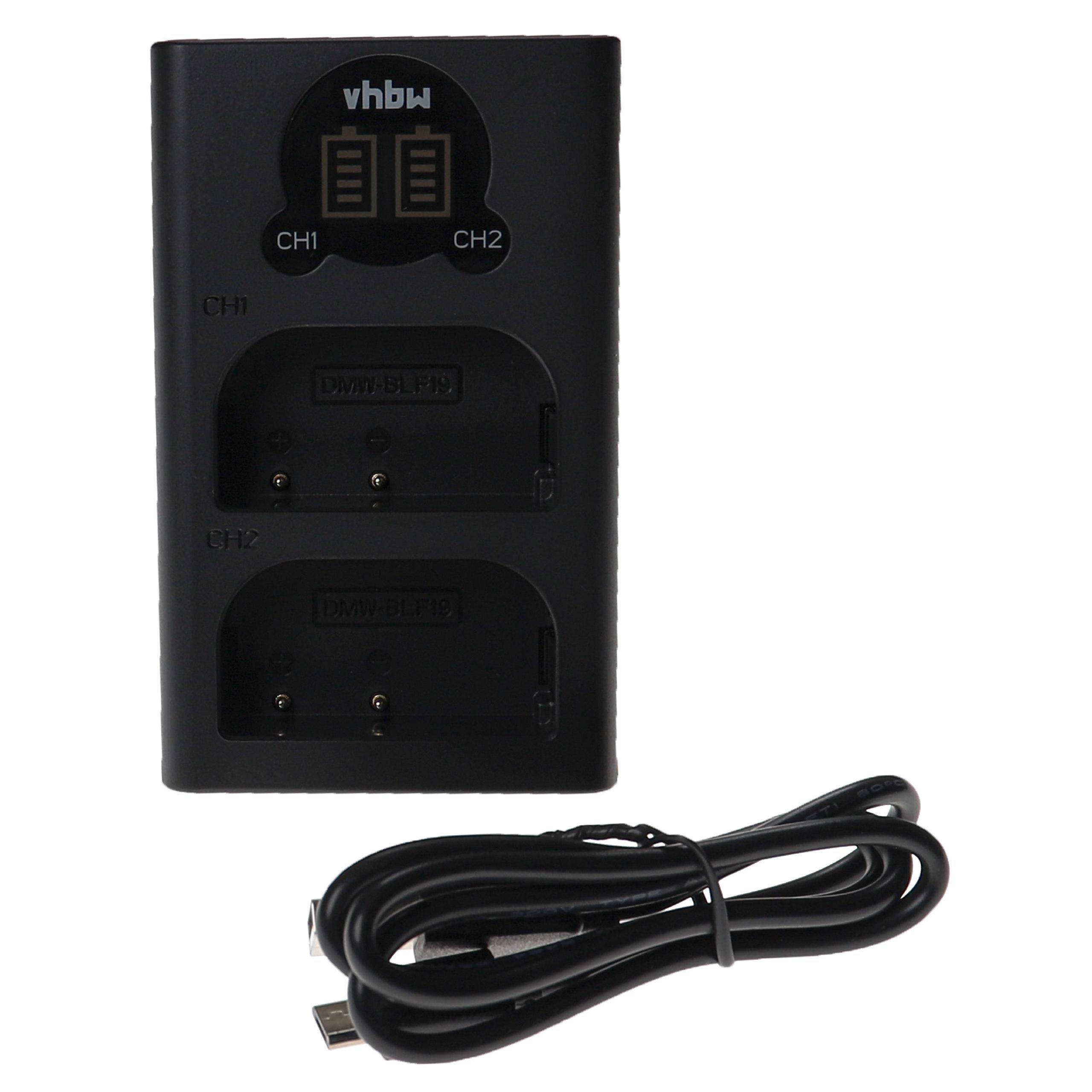 Schwarzes Batterieladegerät mit zwei Schächten, einem Netzkabel und dem Markennamen vhbw.