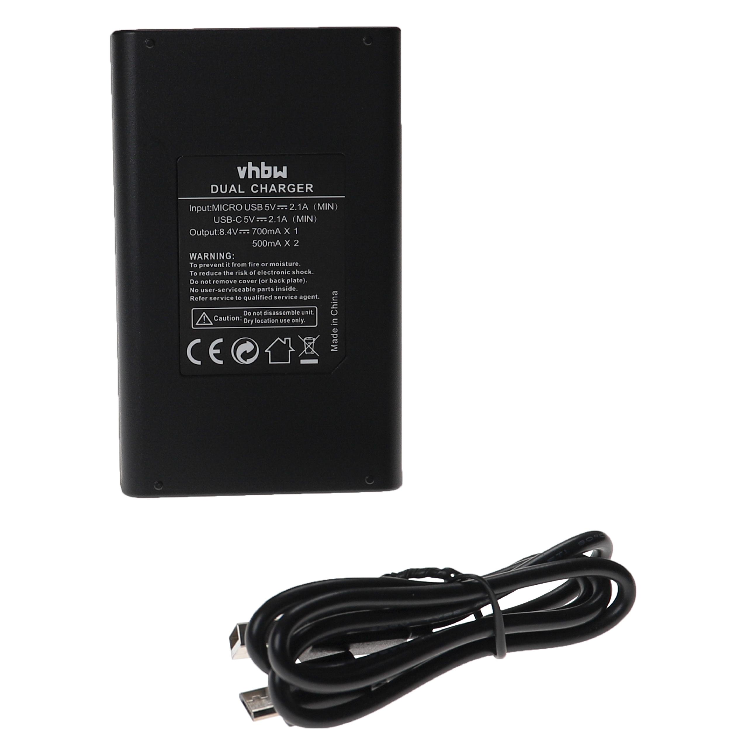Ein schwarzes Dual-Ladegerät mit USB-Kabel. Es hat Text und Warnhinweise.