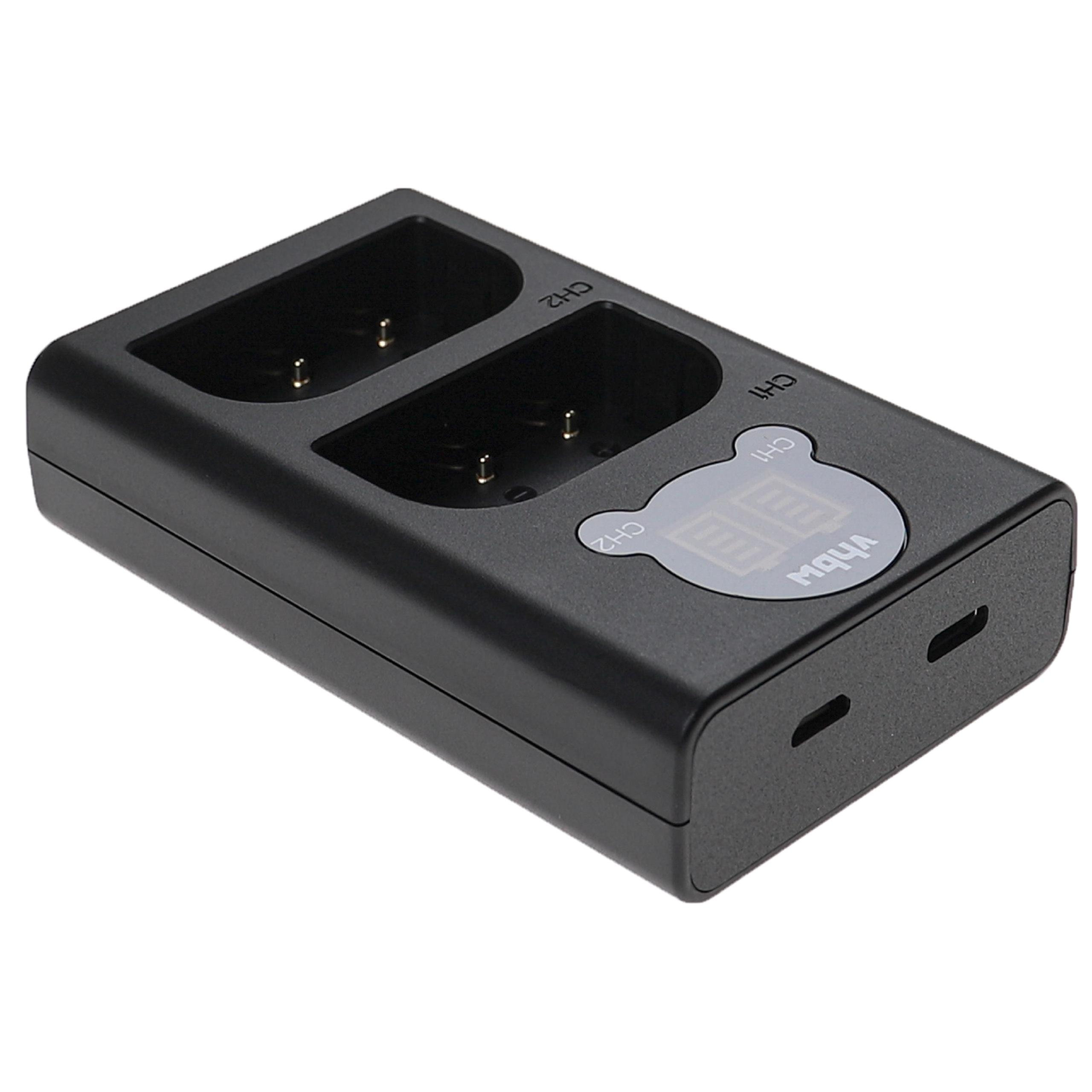 Ein schwarzes Doppel-Akkuladegerät. Es hat zwei Ladeschächte, ein Display und zwei USB-Anschlüsse. Der Markenname 'vbhw' ist sichtbar.
