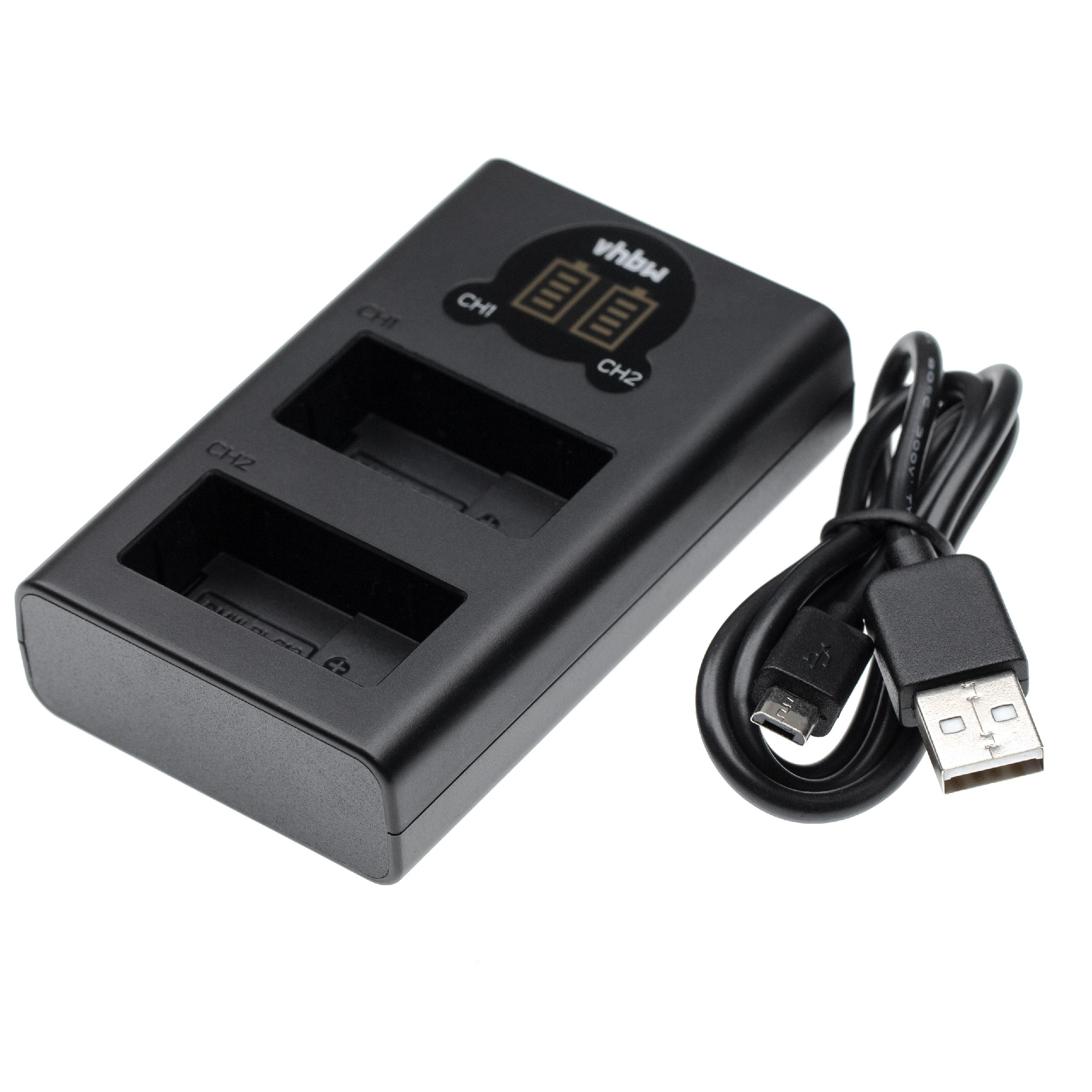 Ein schwarzes Batterieladegerät mit zwei Steckplätzen und einem USB-Kabel liegt auf einer weißen Oberfläche.