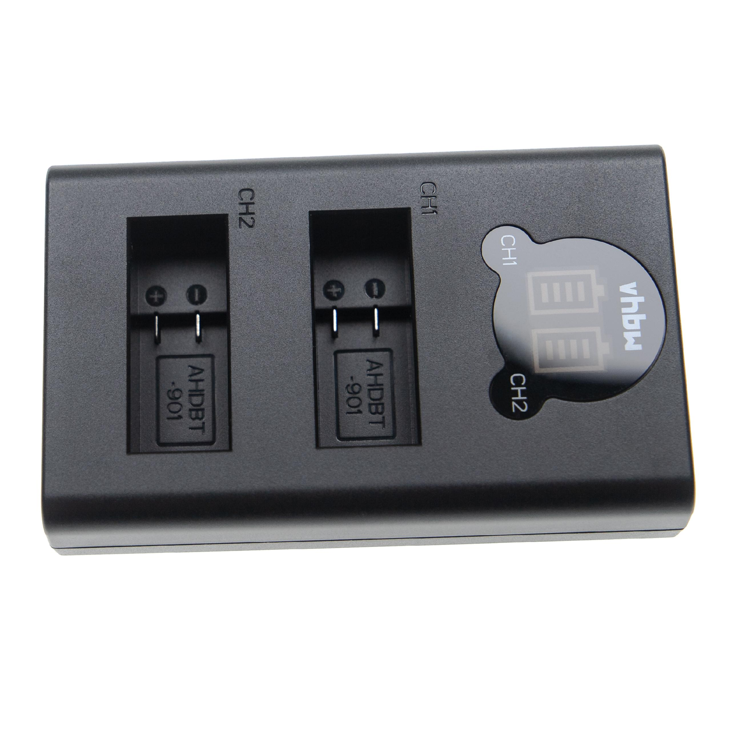 Ein schwarzes Batterieladegerät mit zwei Schlitzen und einem LCD-Display. Es zeigt Batterie-Symbole und hat den Markennamen 'vhbw'.