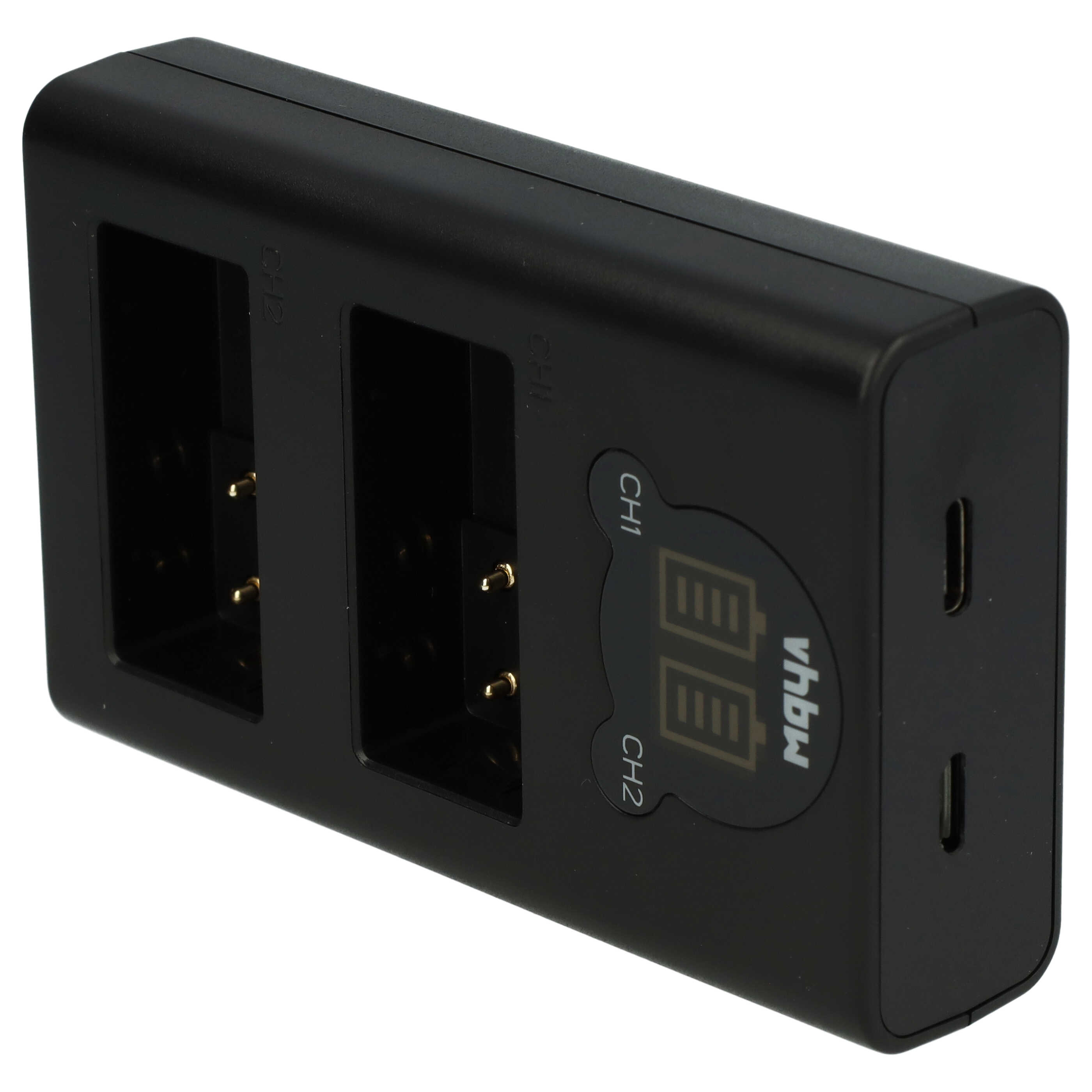 Ein schwarzes Batterieladegerät mit zwei Ladeanschlüssen und einem LCD-Bildschirm. Das Ladegerät hat einen USB-Anschluss und einen Markennamen.
