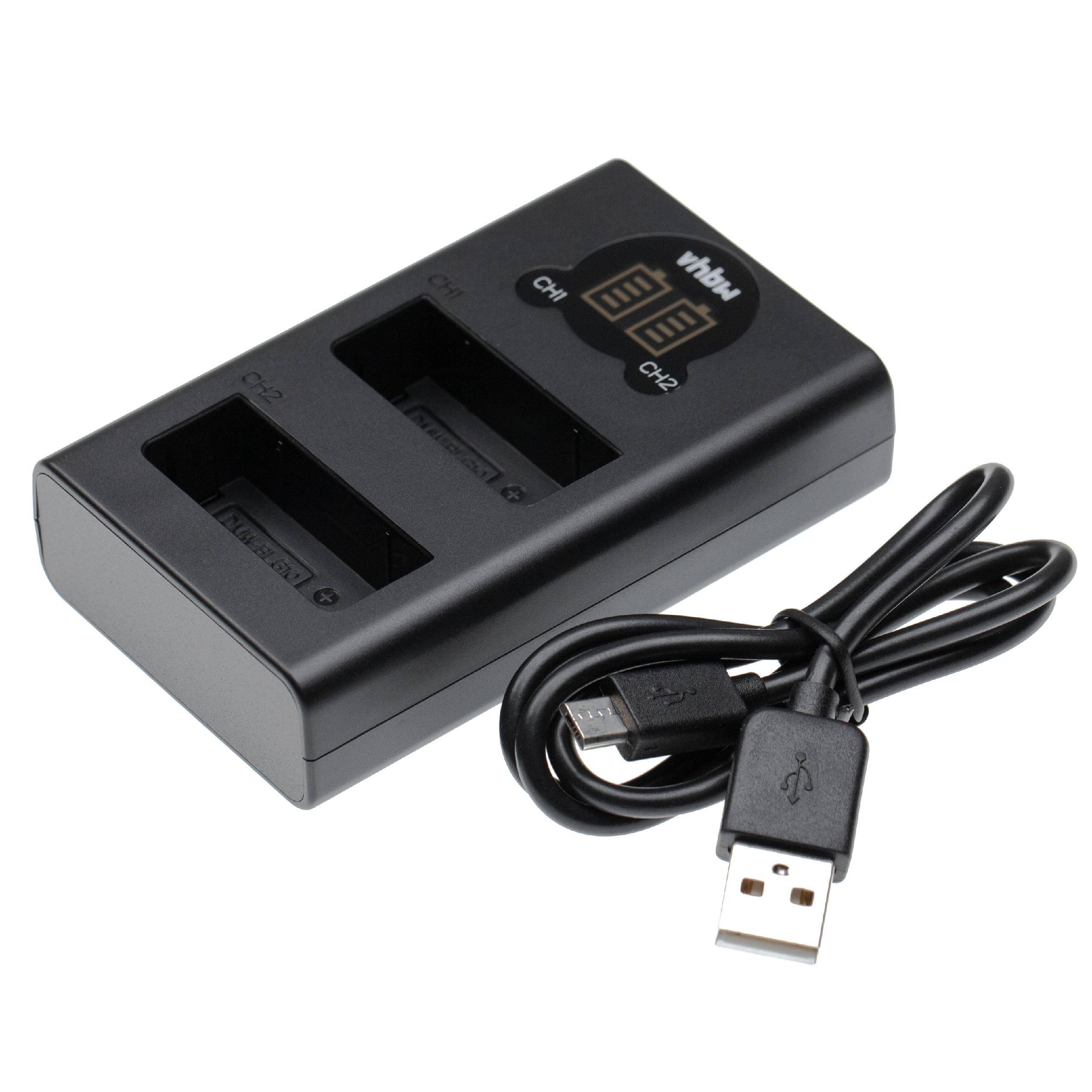 Schwarzes Batterieladegerät mit zwei Schlitzen, einem USB-Kabel und einem USB-Anschluss. Das Ladegerät hat Etiketten.