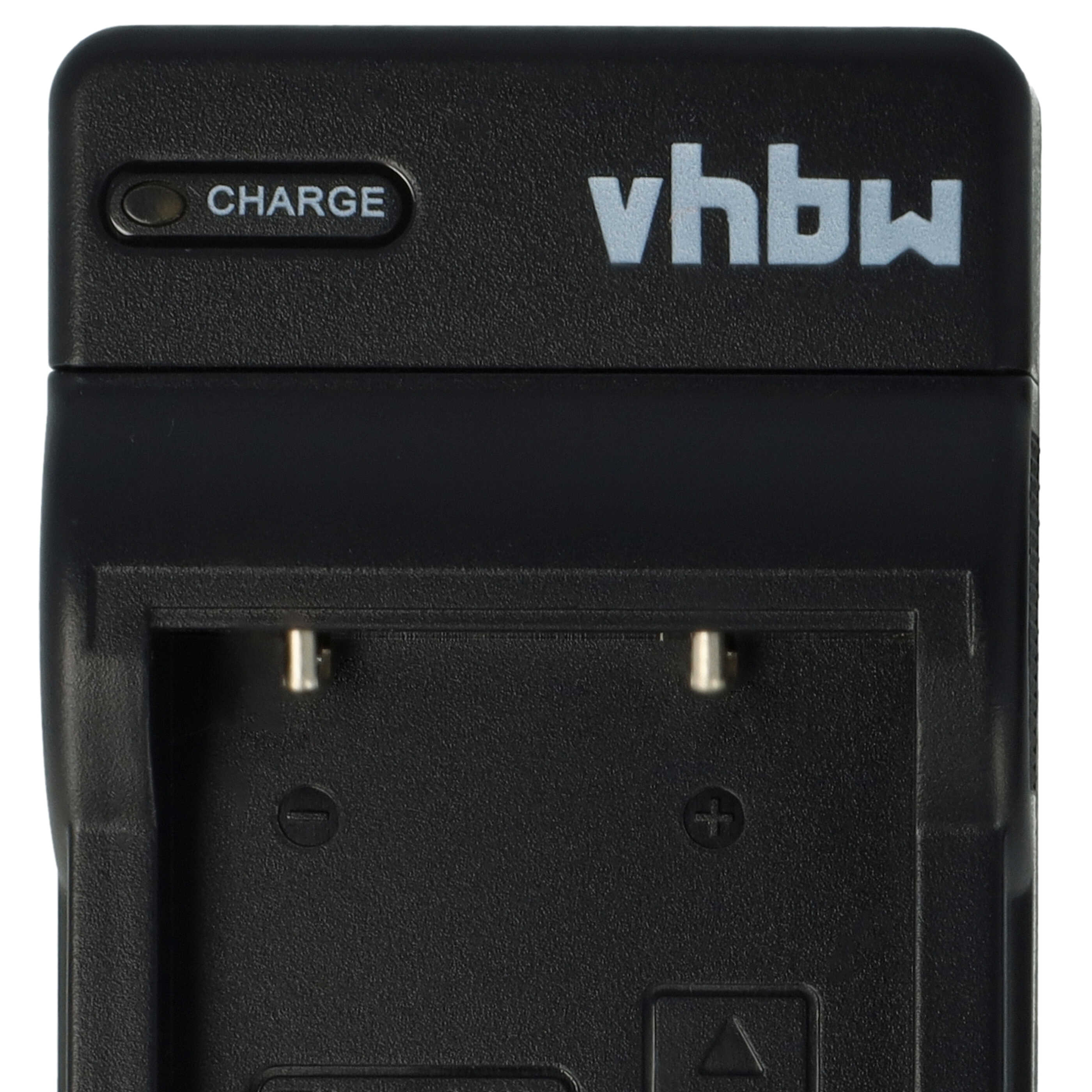 Schwarzes Ladegerät mit weißem Text: vhbw und CHARGE. Es hat zwei Metallstifte und eine Ladeanzeige.