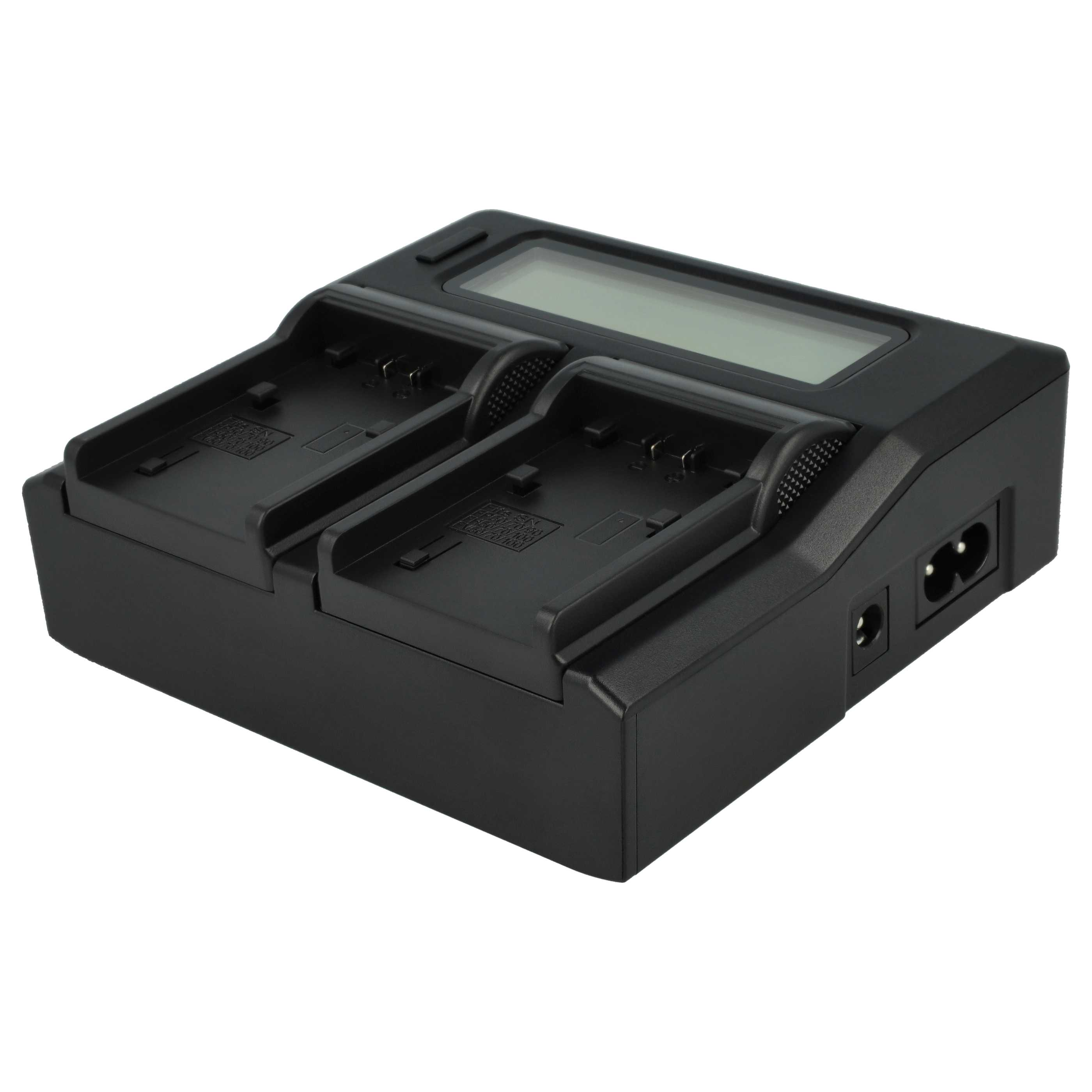 Ein schwarzes Batterieladegerät mit zwei Schächten, einem Digitaldisplay und Stromeingängen. Der Hintergrund ist weiß.