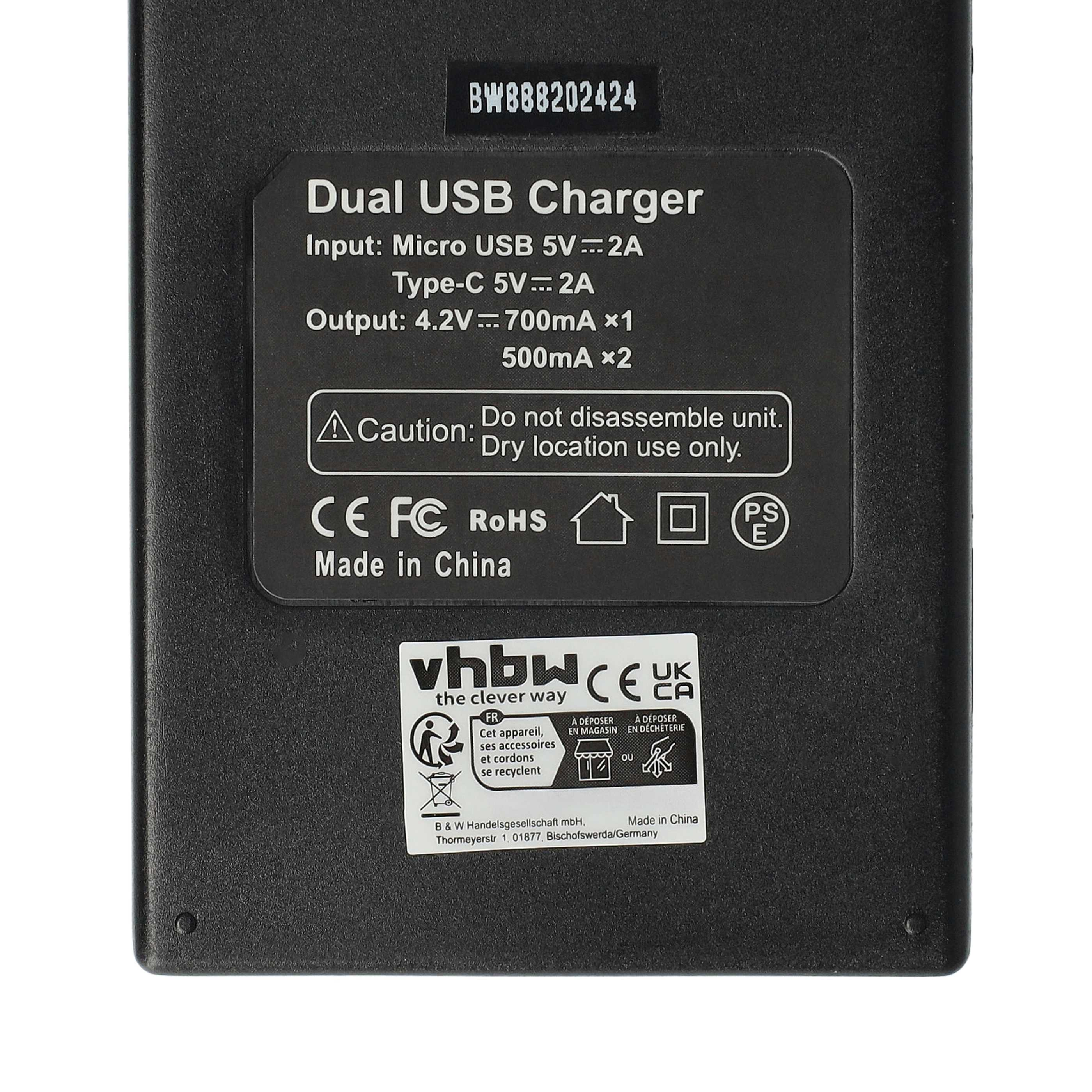 Schwarzes USB-Ladegerät mit Text und Symbolen, darunter "Dual USB Charger" und Recyclinghinweise.