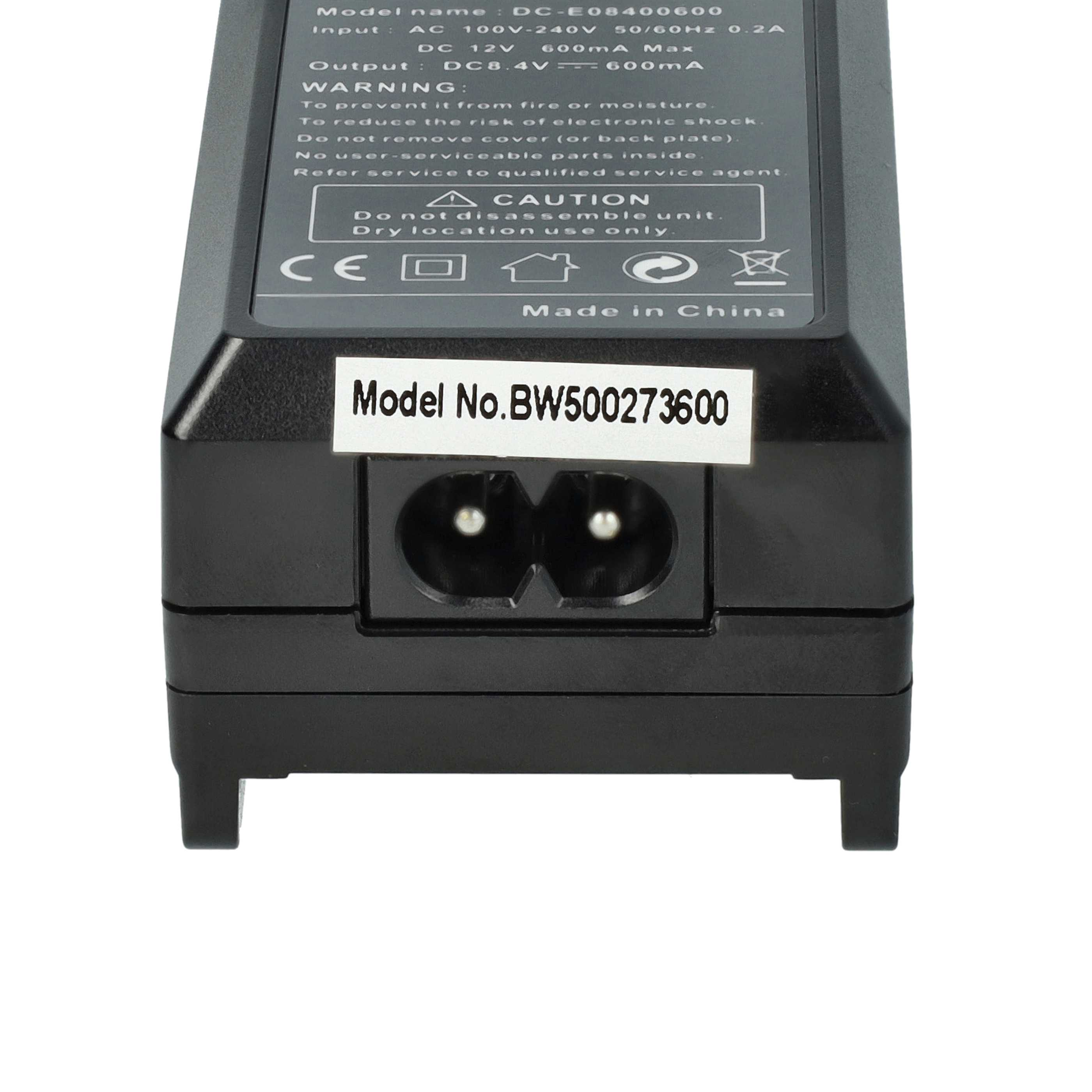 Ein schwarzes Netzteil mit Text und Warnhinweisen. Es hat die Modellnummer BW500273600 und einen zweipoligen Eingang.