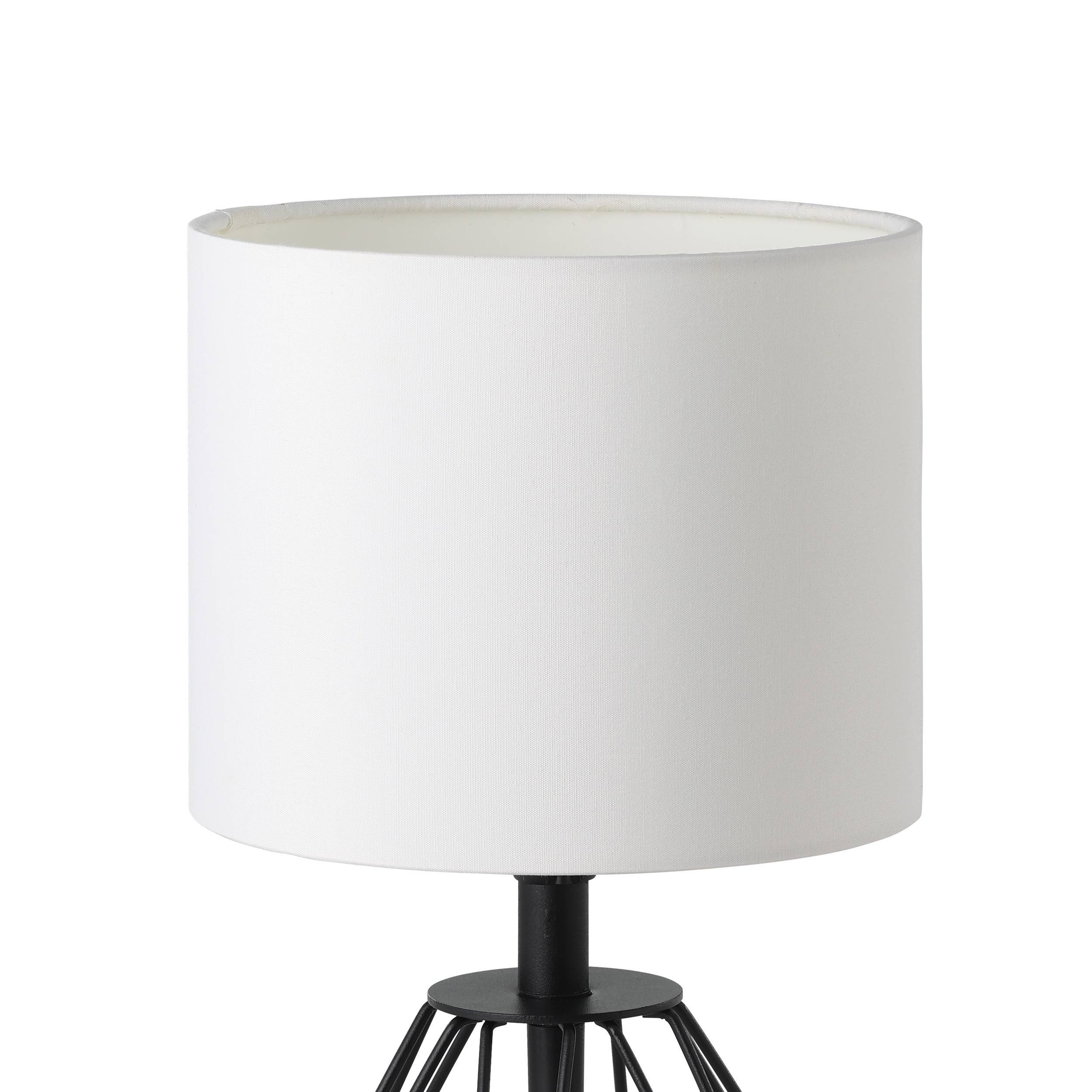 Un paralume bianco su una base in metallo nero. Il paralume è cilindrico e la base ha un design a treppiede.
