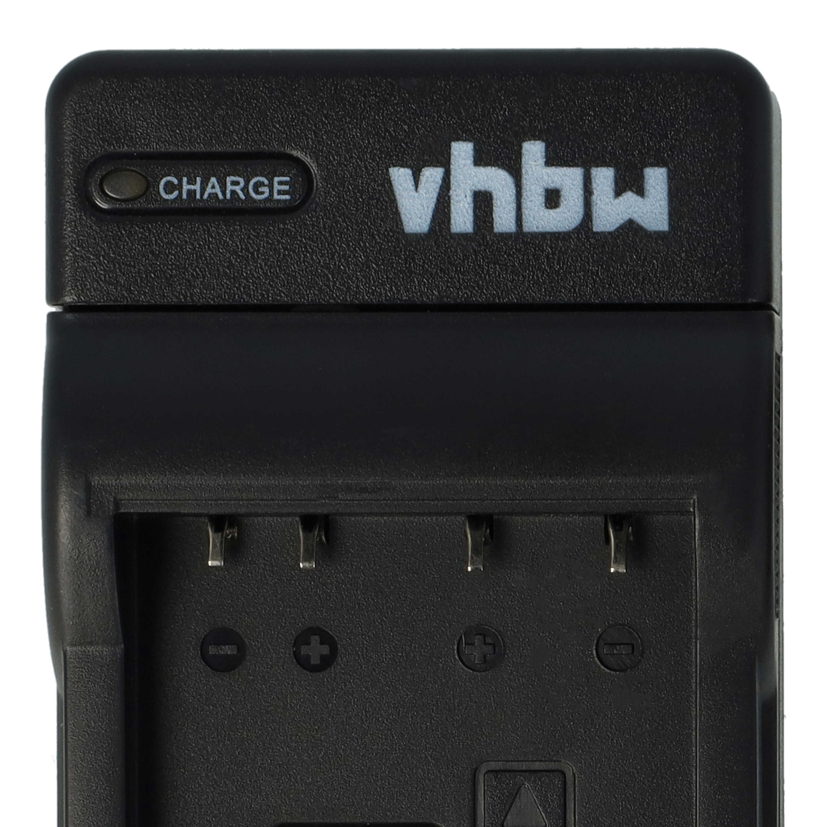 Schwarzes vhbw-Batterieladegerät. Es hat eine Ladeanzeige und Steckplätze für Batterien. Der Hintergrund ist weiß.