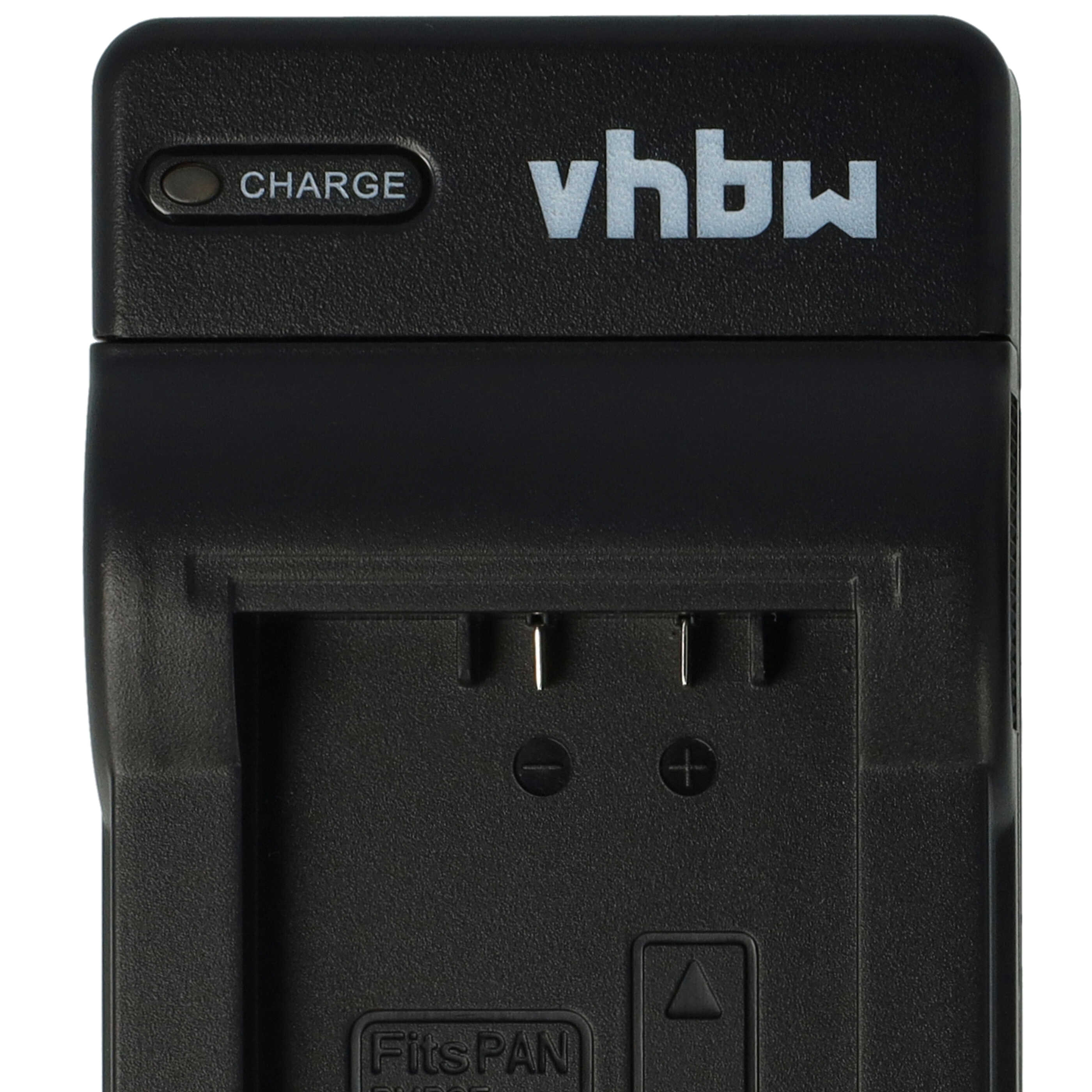 Schwarzes vhbw-Kamera-Akkuladegerät. Zeigt die Anzeige 'CHARGE' und das Logo. Verfügt über Stifte, Plus- und Minuszeichen und ein Dreieck.