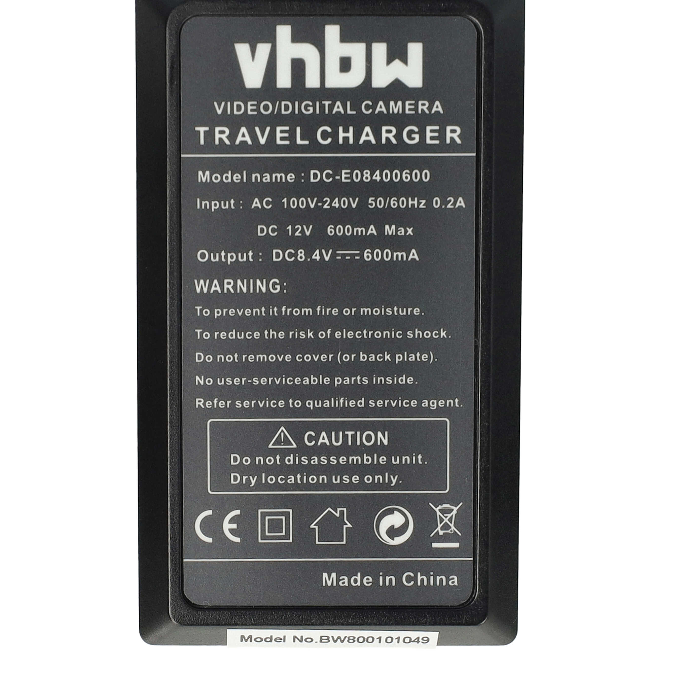 Ein schwarzes Ladegerät mit weißem Text. Es lautet 'vhbw VIDEO/DIGITAL CAMERA TRAVEL CHARGER' und enthält Warnungen und Vorsichtshinweise.