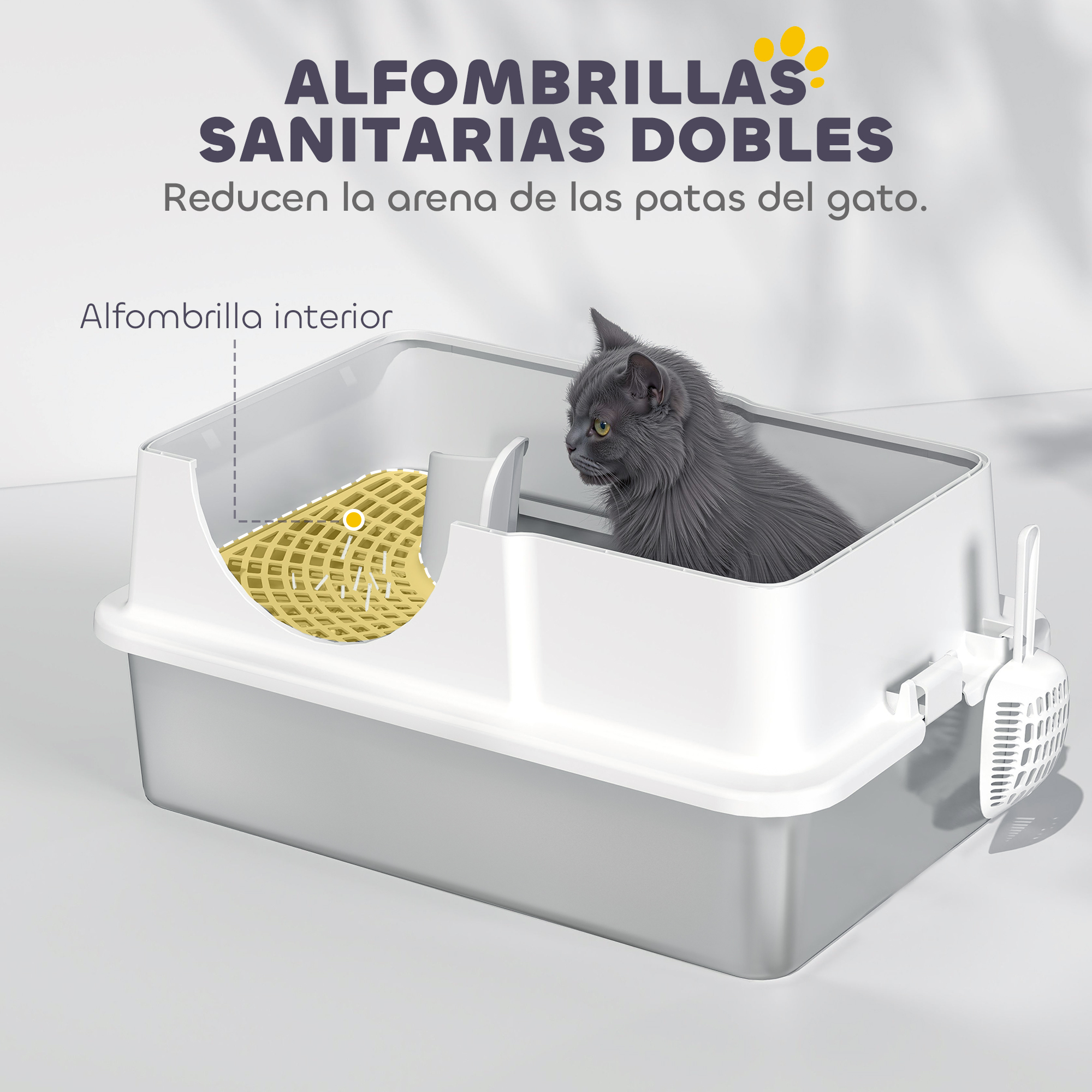 Un gato gris está en una caja de arena blanca y gris. Hay una alfombrilla amarilla adentro. El texto en español dice que reduce la arena en las patas.