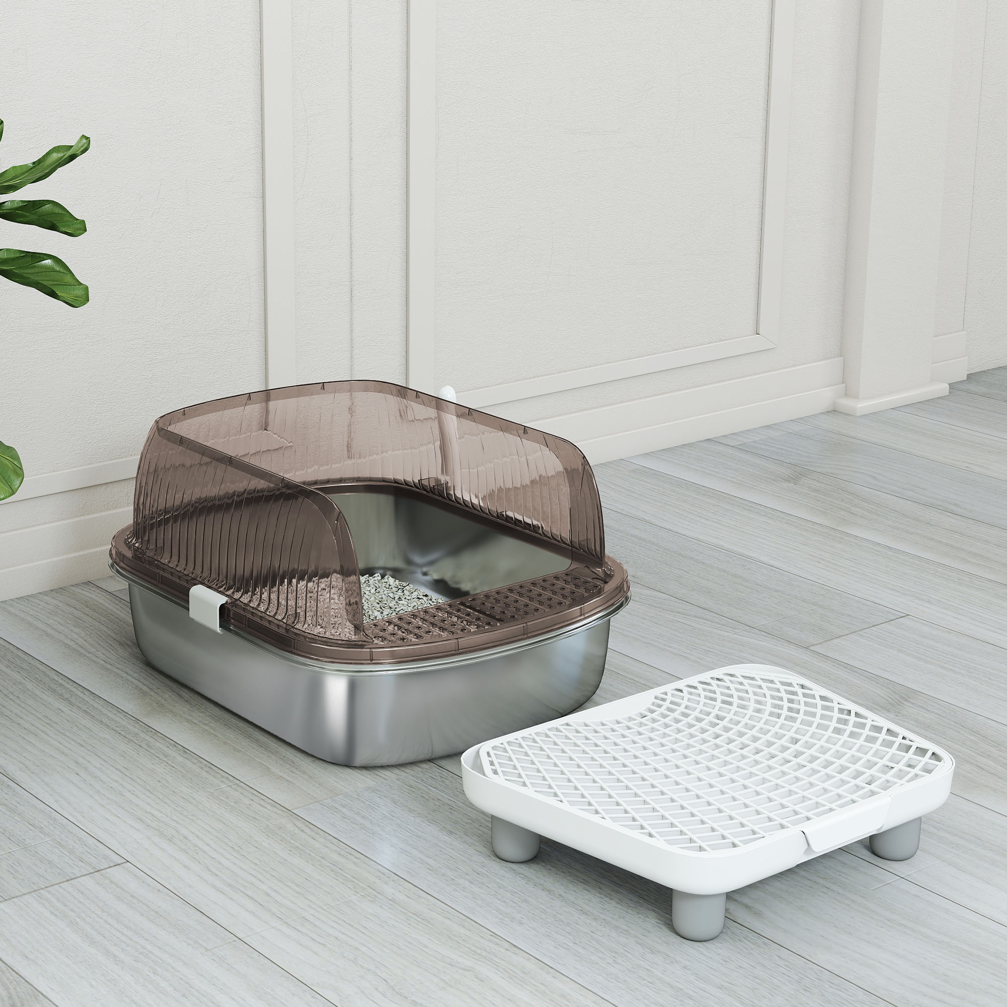 Una caja de arena para gatos con tapa marrón transparente y rejilla blanca separada. Está sobre un suelo de madera clara.