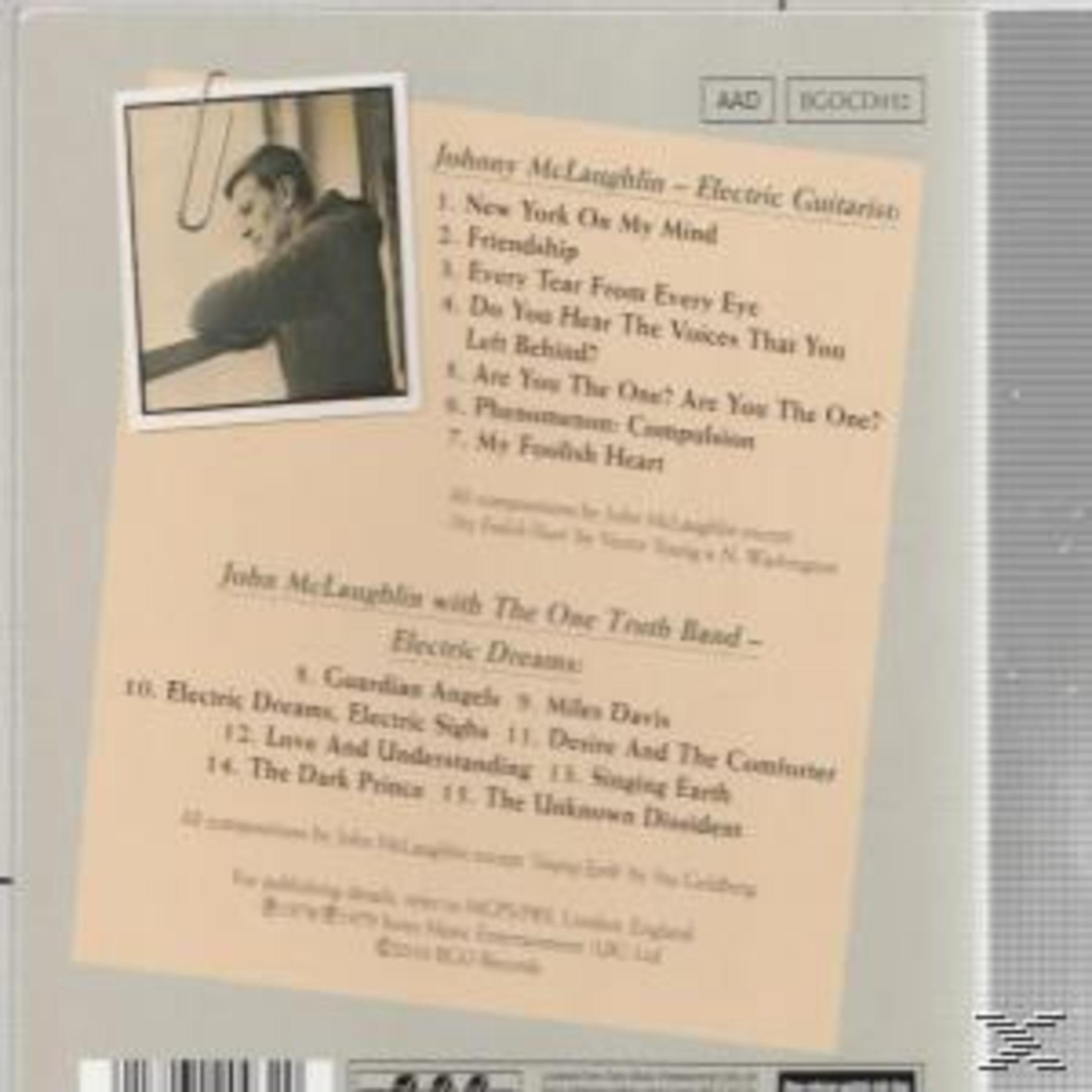 Albumcover mit Foto von Johnny McLaughlin und Songtiteln. Das Bild hat einen beigen Hintergrund mit einem Foto einer Person.