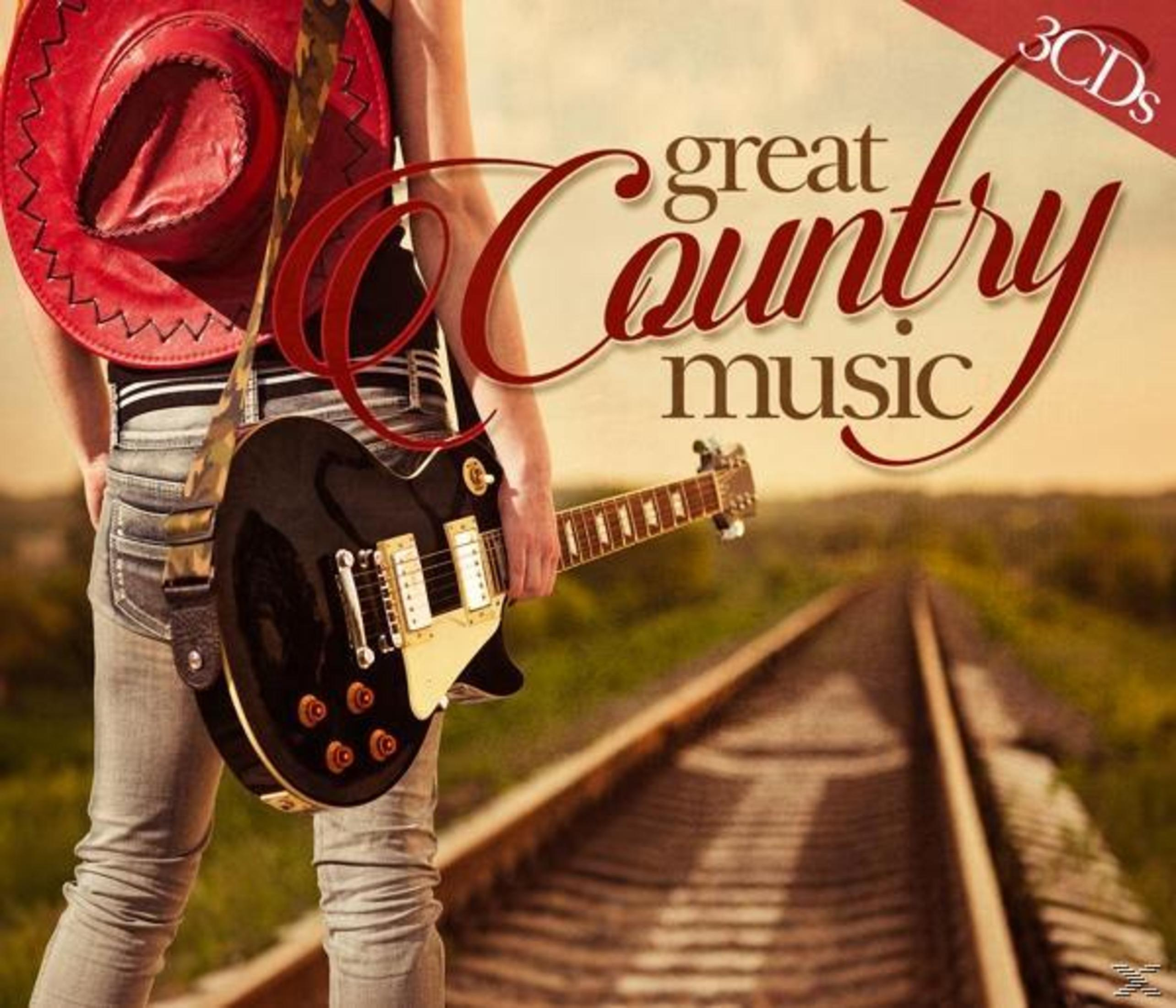 Eine Person mit Gitarre und rotem Hut steht auf einem Bahngleis, die Worte Great Country Music werden angezeigt.