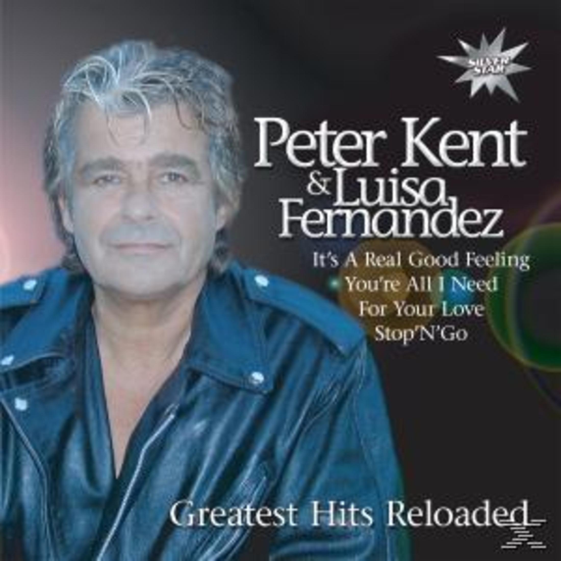 Albumcover mit Peter Kent und Luisa Fernandez. Titel: Greatest Hits Reloaded. Enthält Songtitel. Mann in blauer Jacke.