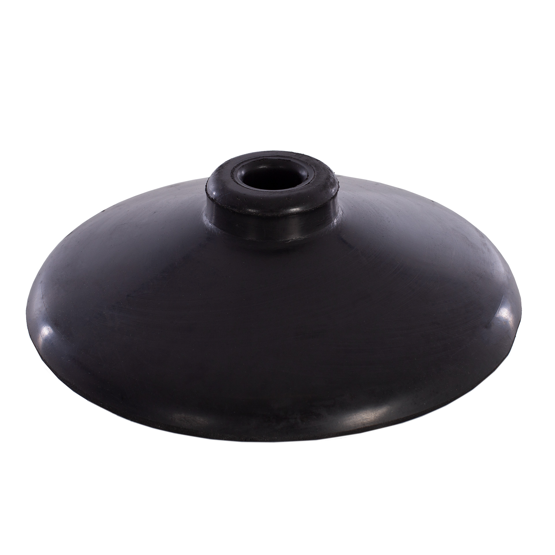 Un desatascador de goma negro. Tiene una base plana y circular y una parte superior cilíndrica con un agujero en el centro.