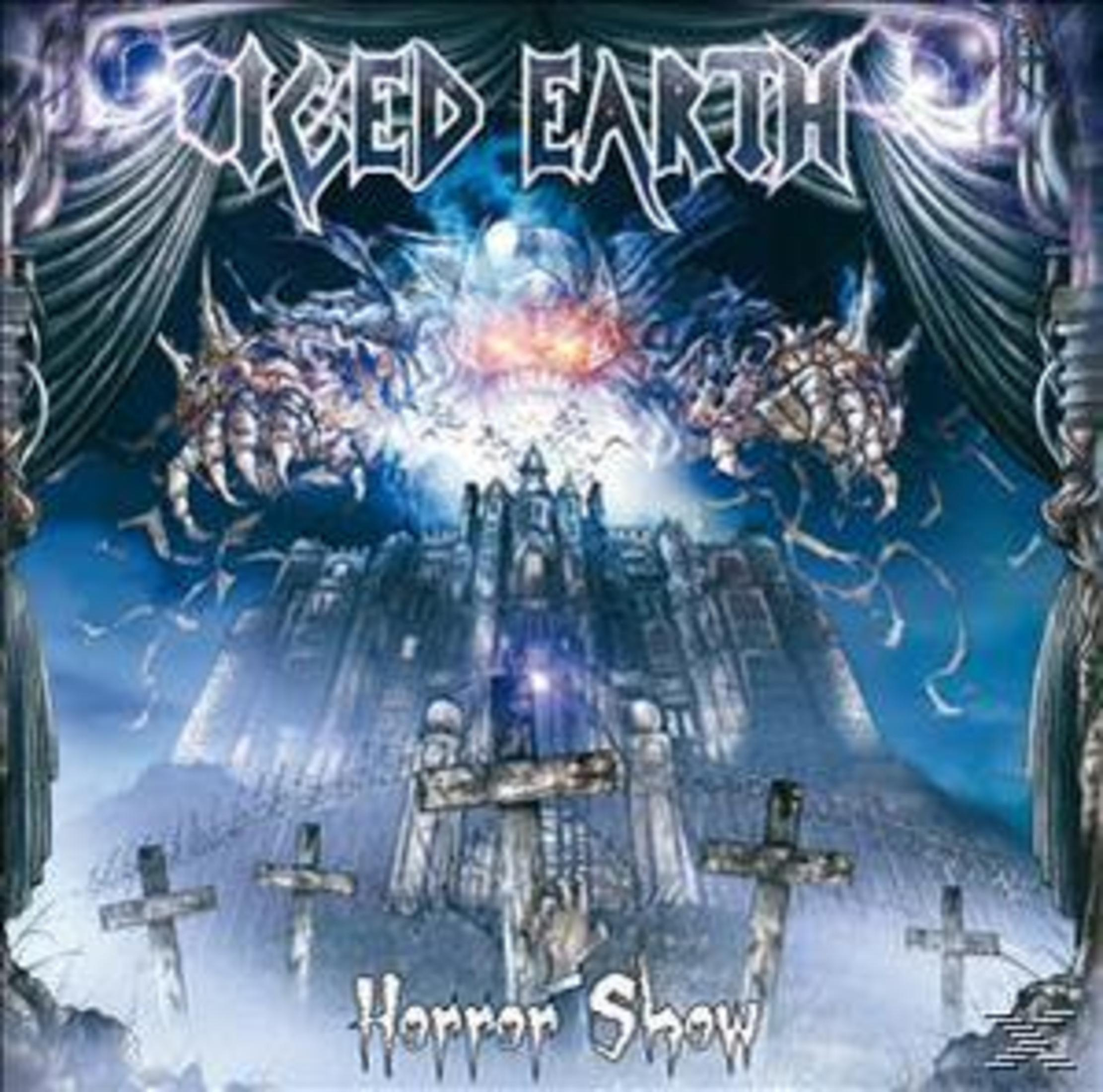 Albumcover. Iced Earth Logo über einer Schloss-Szene mit Kreuzen und den Worten 'Horror Show'.