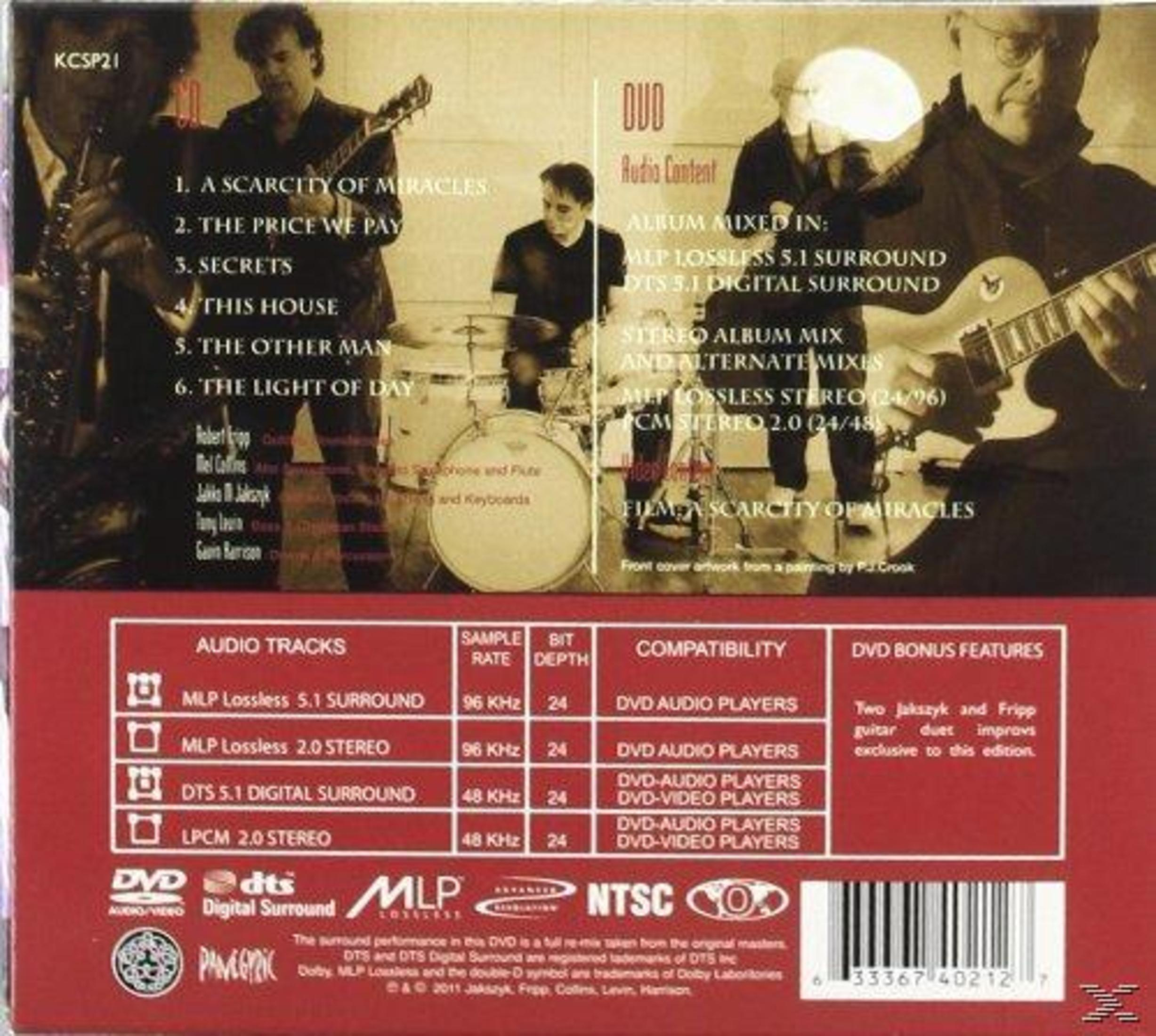 DVD cover with band members, audio tracks, and bonus features listed. Includes album title and track list.
