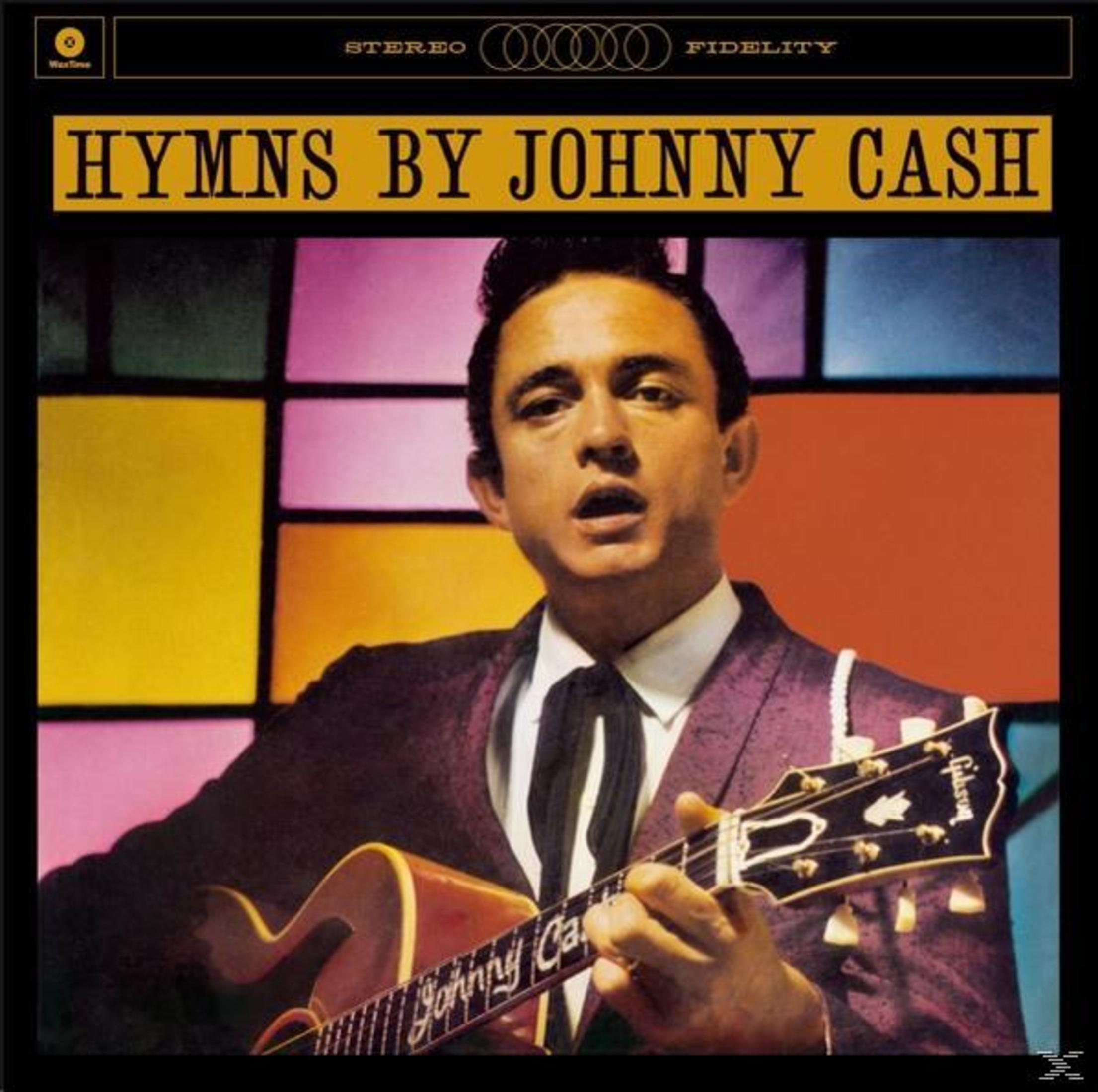 Albumhoes van Johnny Cash. Hij houdt een gitaar vast, draagt een pak. De achtergrond heeft kleurrijke glas-in-loodramen.