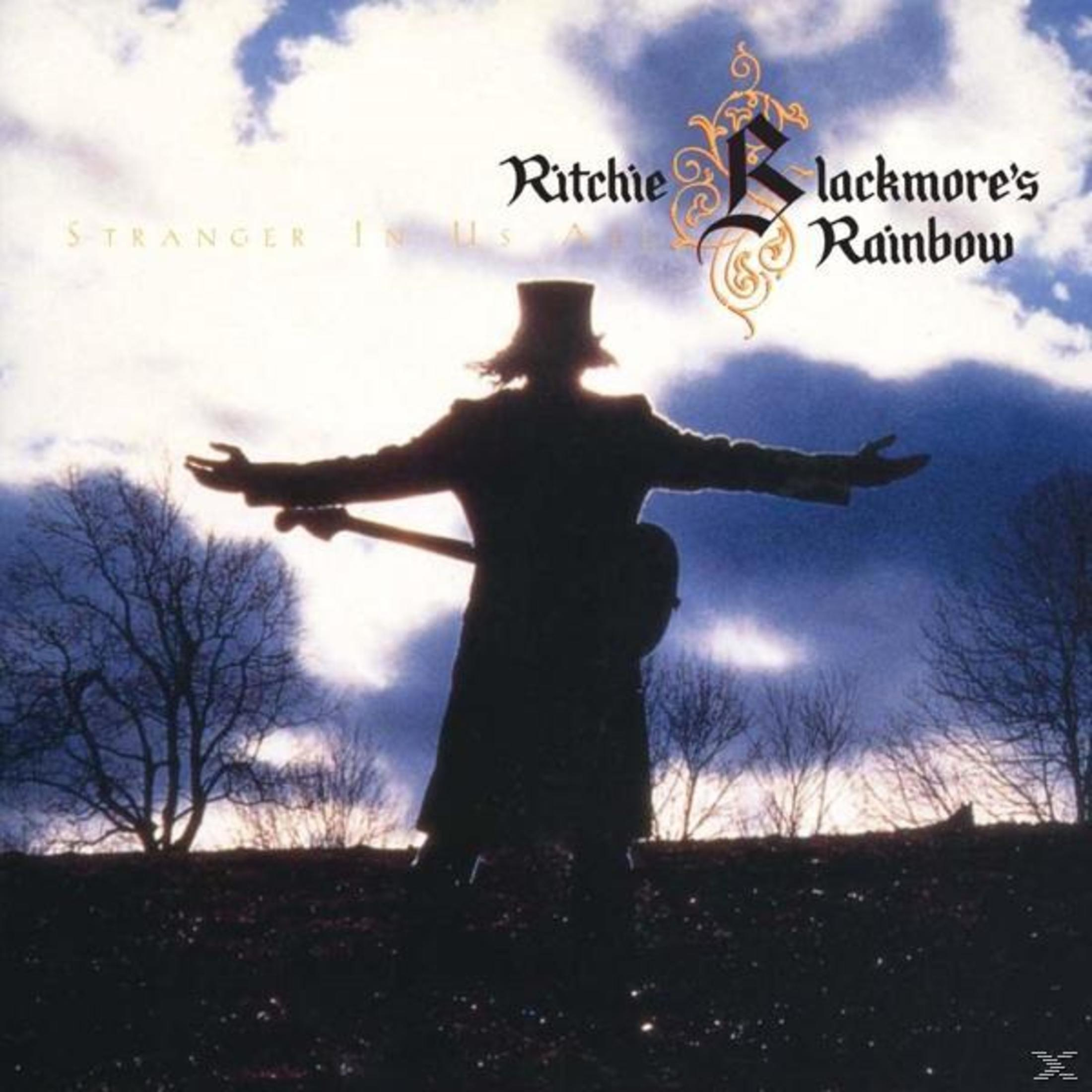 Silhouette einer Figur mit ausgestreckten Armen, die eine Gitarre hält, vor einem bewölkten Himmel mit dem Bandnamen 'Blackmore's Rainbow'.